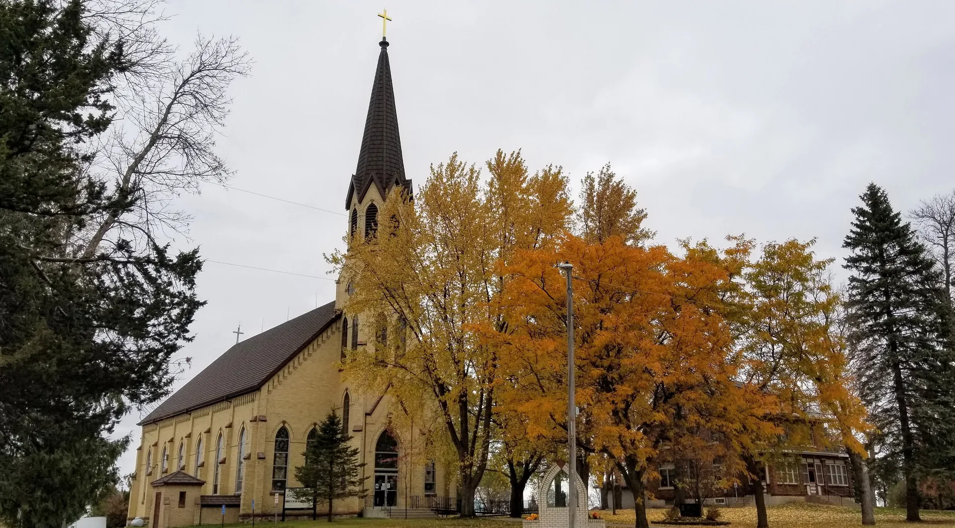 St. Anthony Church with autumn trees in St. Anthony, Stearns County, Minnesota.