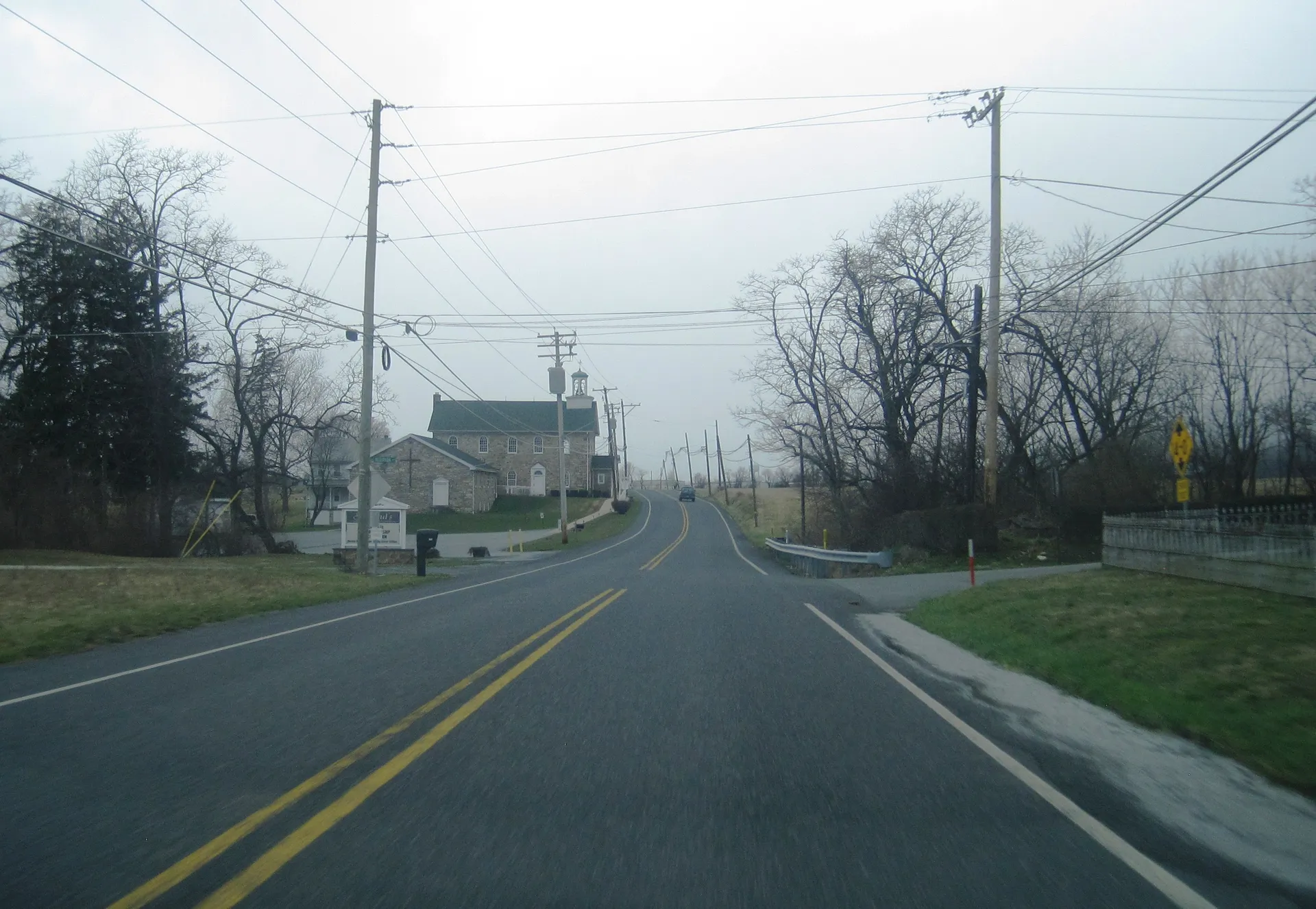 Old Route 22 approaches Reservoir Road near Edenburg, with St. Paul's Lutheran Church visible in the distance.