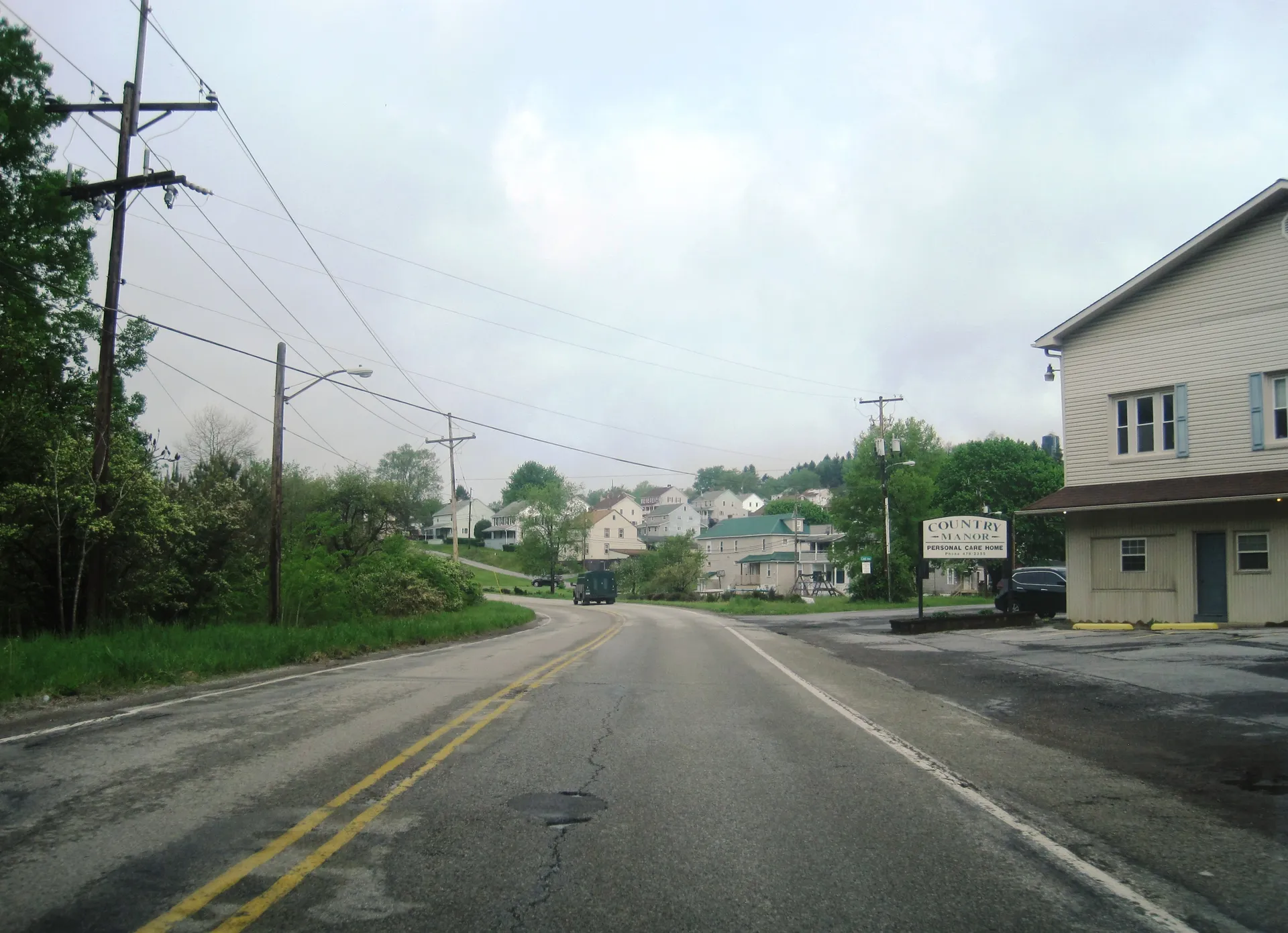 Route 601 passes through Jerome, a Conemaugh Township village in Somerset County, with houses on a hillside.
