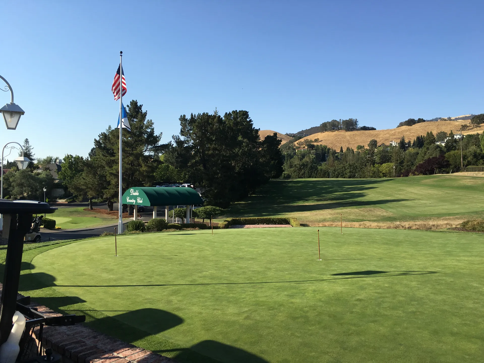 Flag and green fairway at Diablo Valley Country Club in Diablo, California.