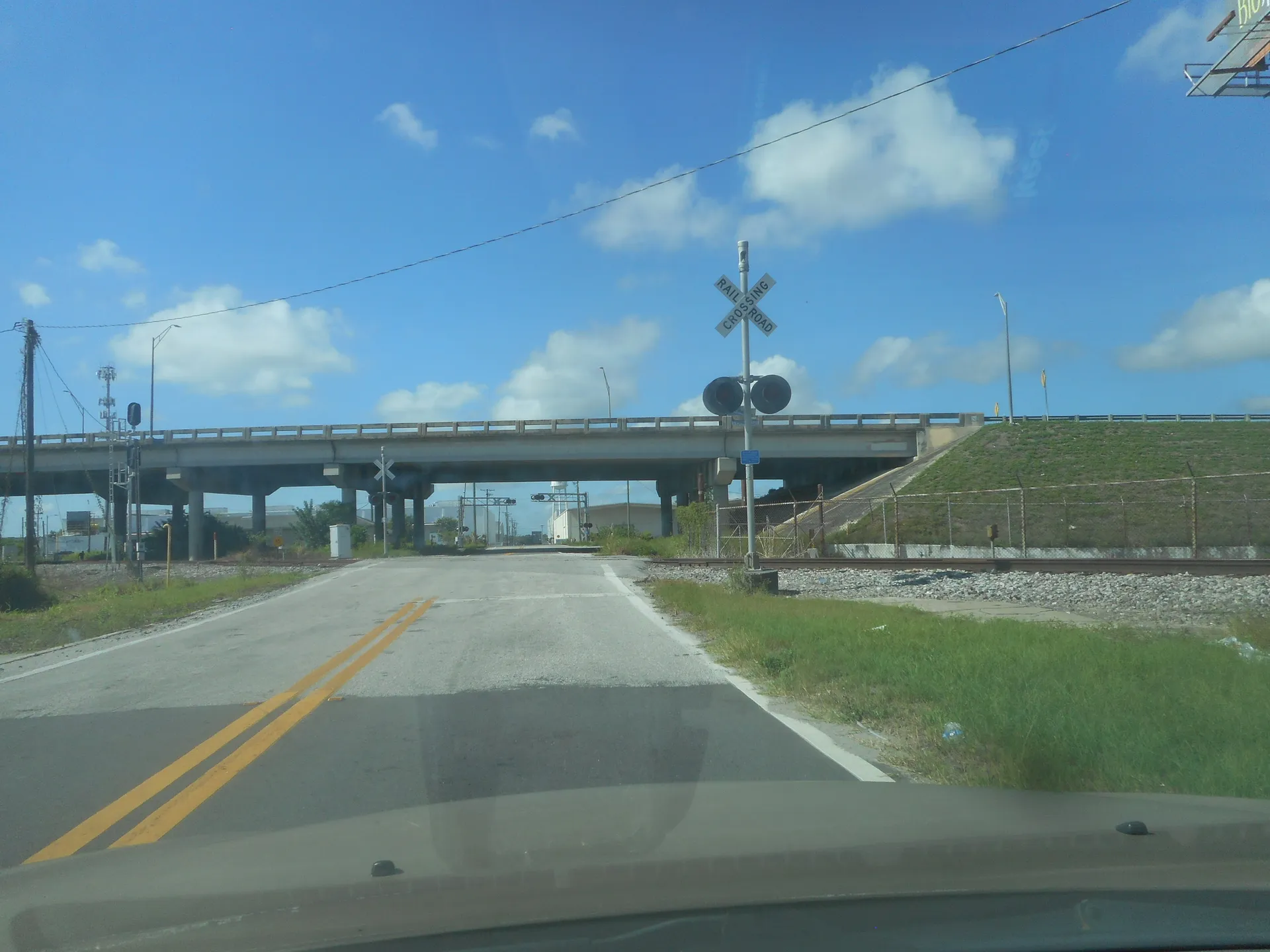 Southbound McKean Street approaching the CSX railroad crossing near the Auburndale Diamond in Auburndale.