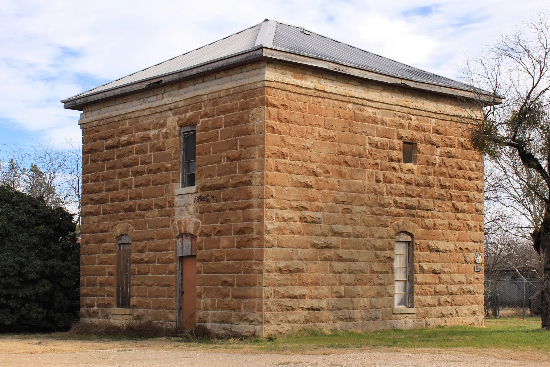 Historic stone First Callahan County Jail in Baird, Texas.