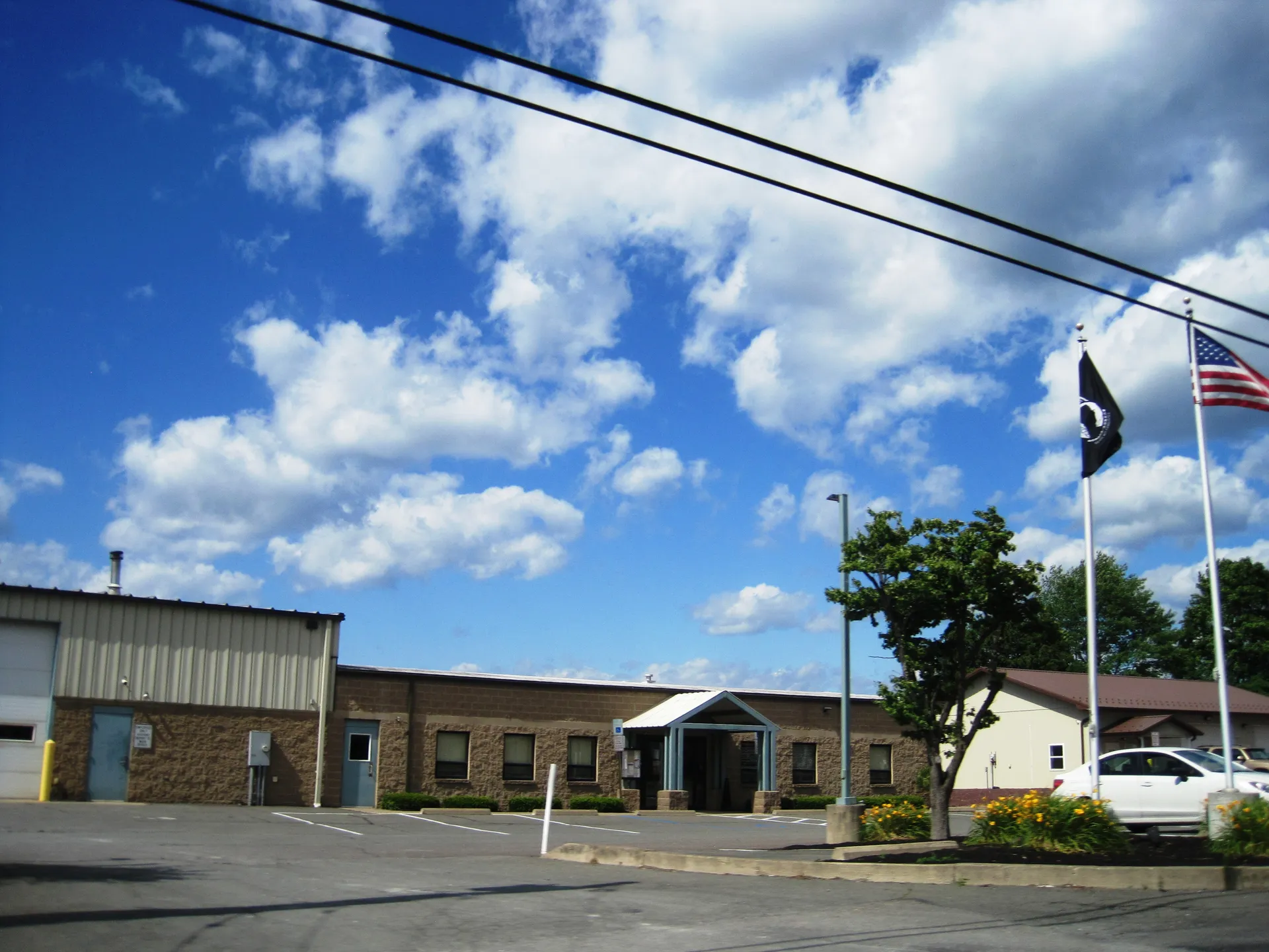 Rush Township's offices in Hometown occupy a long brick-and-siding building with flags out front on Mahanoy Avenue.
