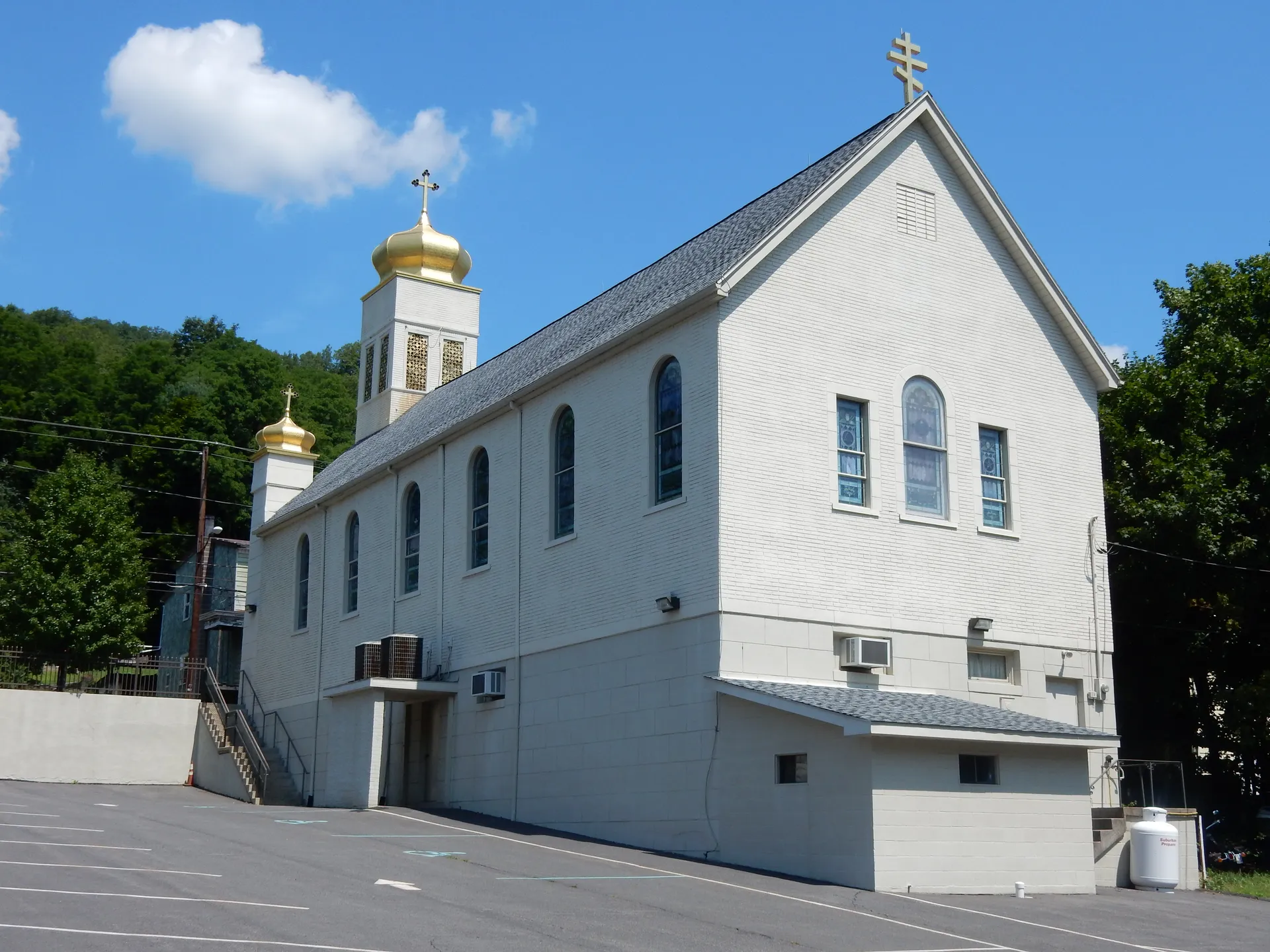 St. John the Baptist Ukrainian Catholic Church in Maizeville, Gilberton borough, is a white church with golden onion domes.