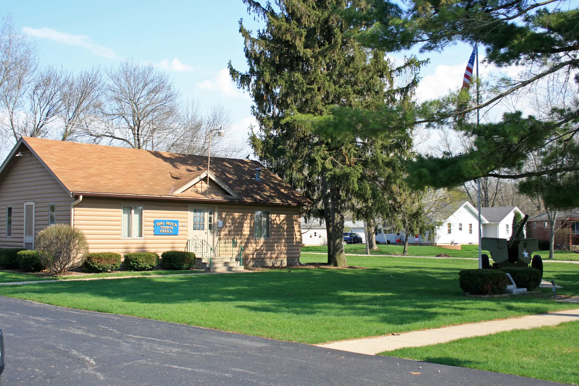 Homes and trees on a residential street in Big Rock, Illinois.