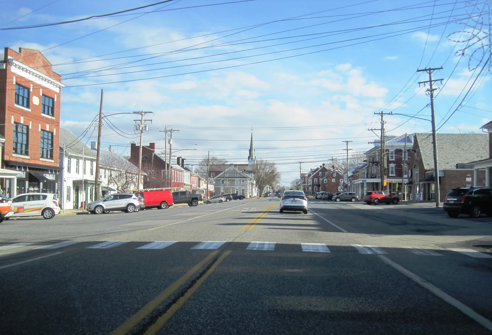 Market Street runs east through Jonestown between Broad and Strawberry streets, lined with brick and frame storefronts.