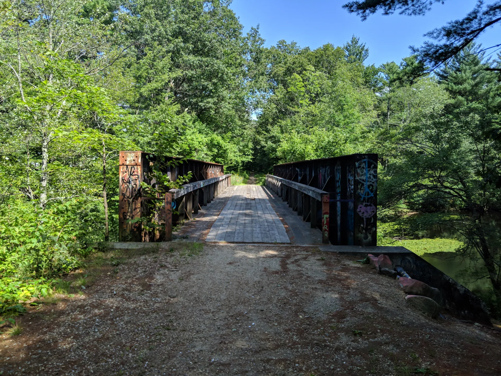 Rail trail bridge on the Rockingham Recreational Rail Trail in Raymond, New Hampshire.