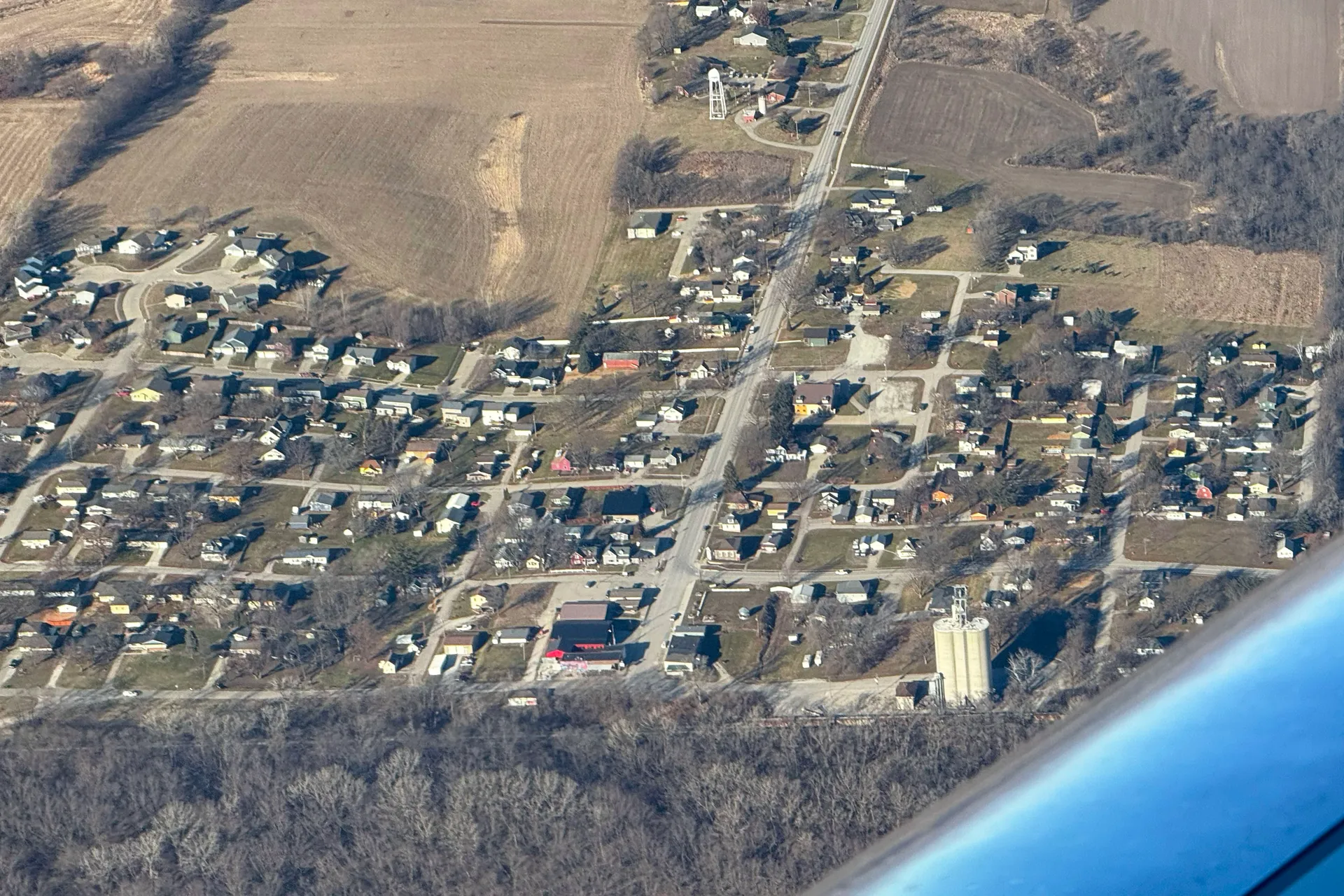 Aerial view of farmland and town in Runnells, Iowa.