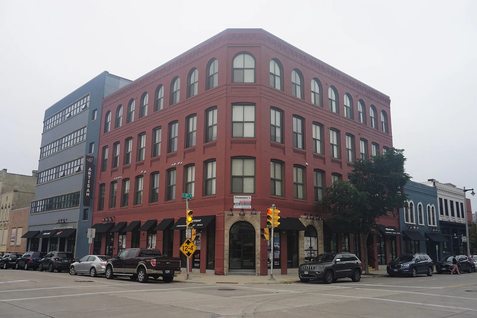 The brick Larkin Building and adjoining storefronts on South Second Street in Walker’s Point, photographed August 14, 2022.