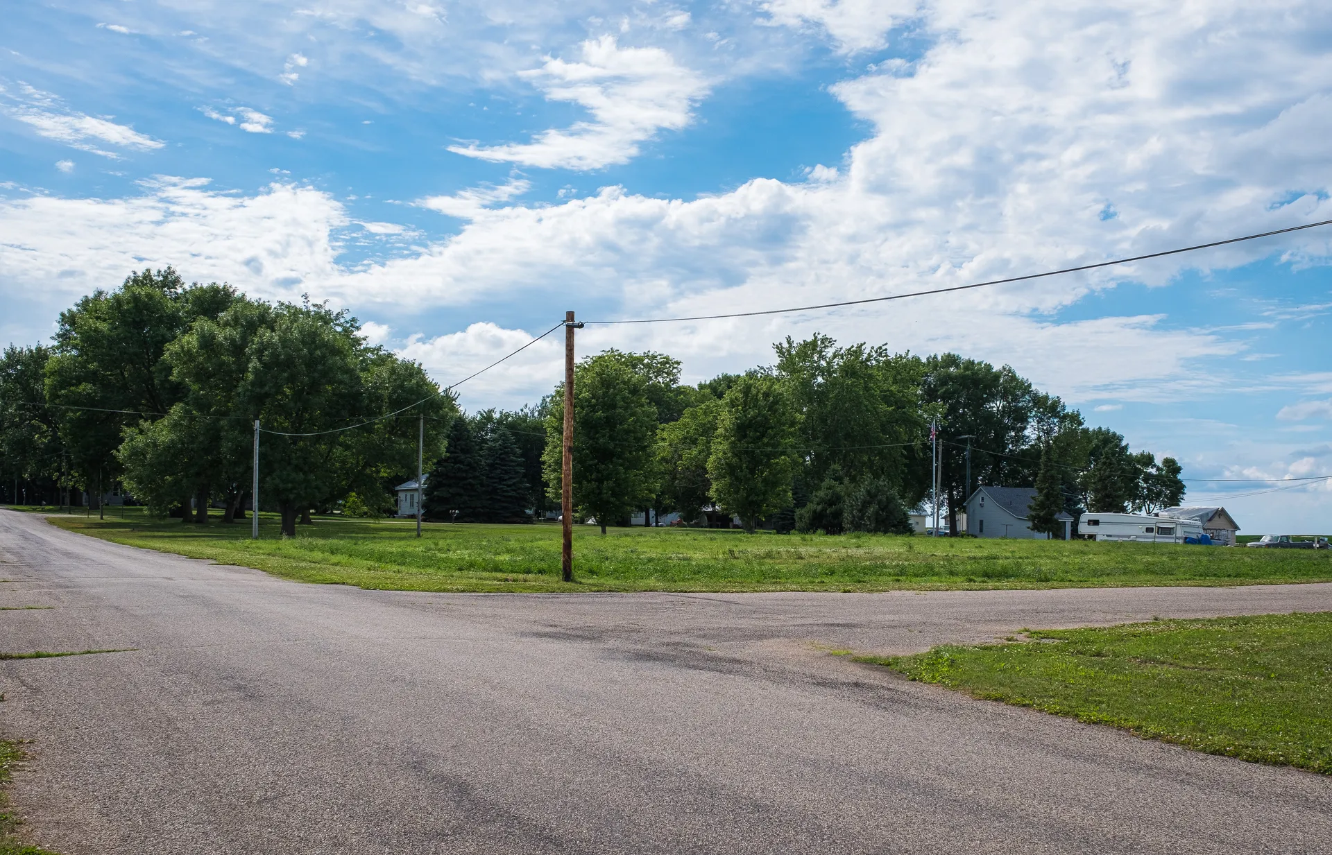 Tree-lined street in Yetter, Iowa.