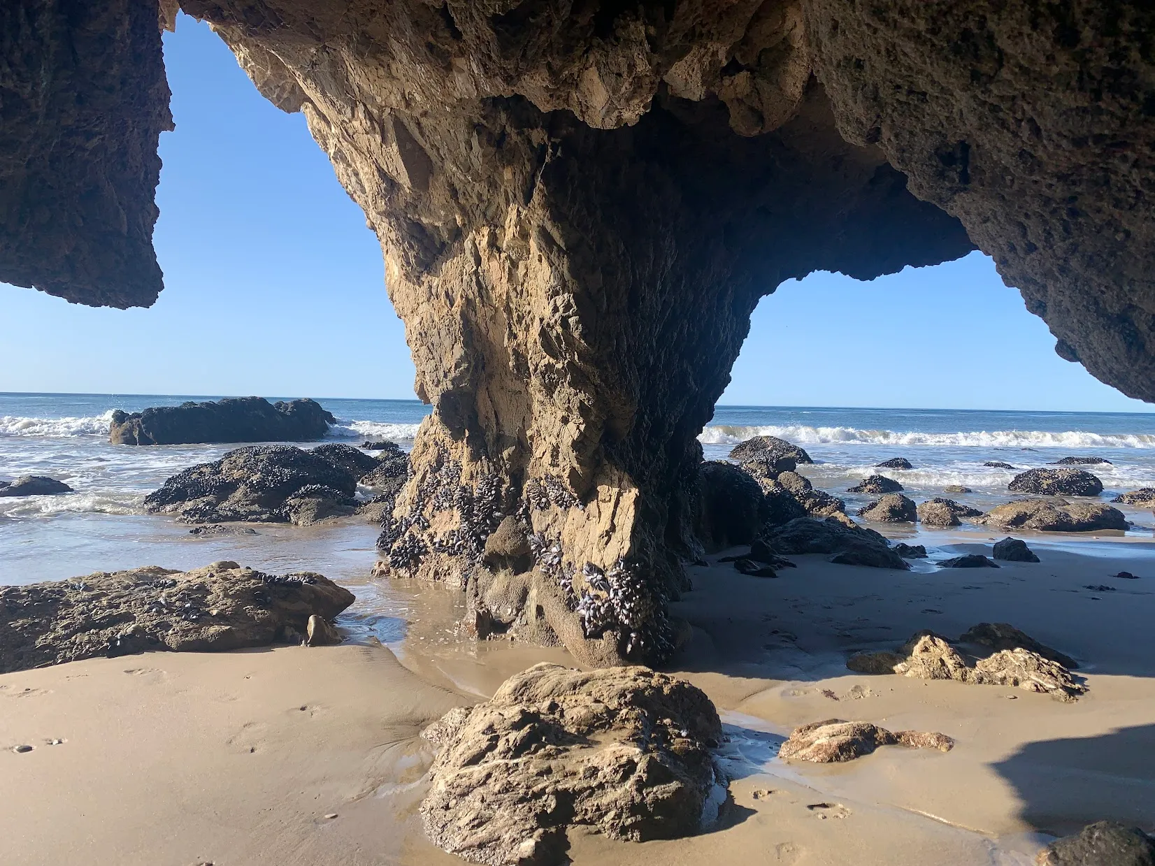 Coastal rock formations at Playa San Juan Leighton in Malibu, California.