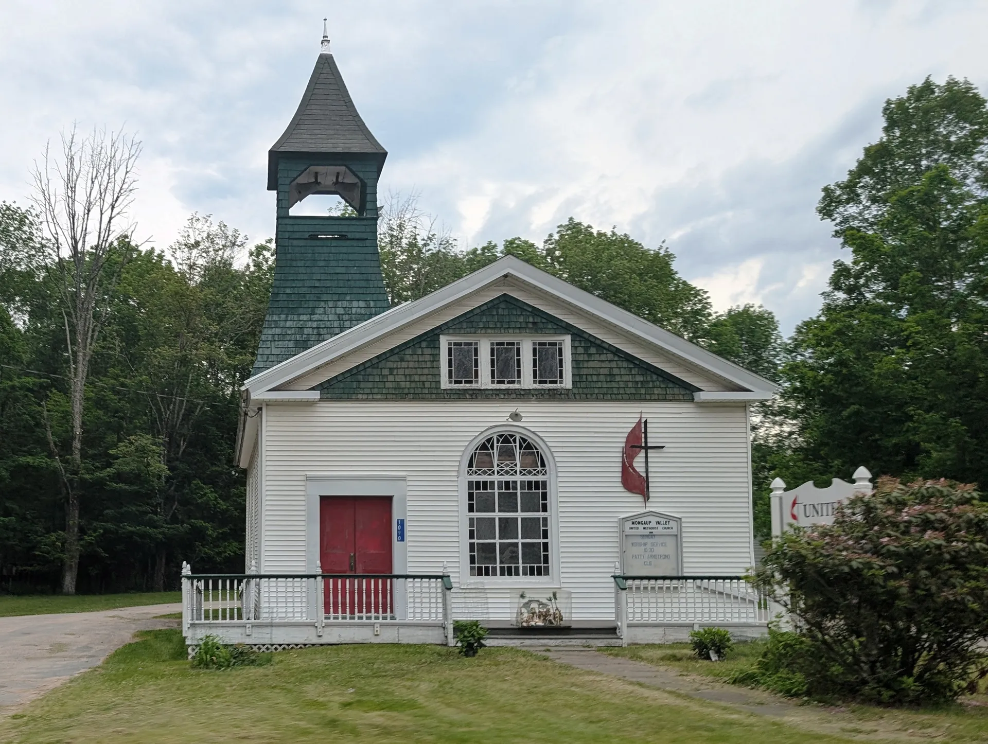 White United Methodist Church with a bell tower in Mongaup Valley, New York.
