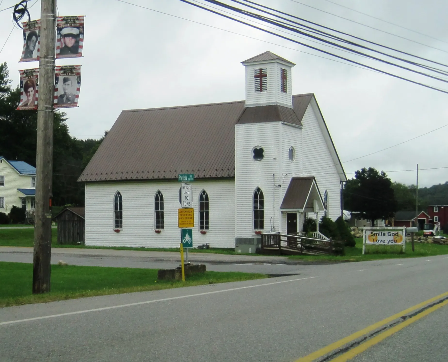 Crenshaw Community Church is a white clapboard church with a square belfry, set beside U.S. Route 219 in Snyder Township.