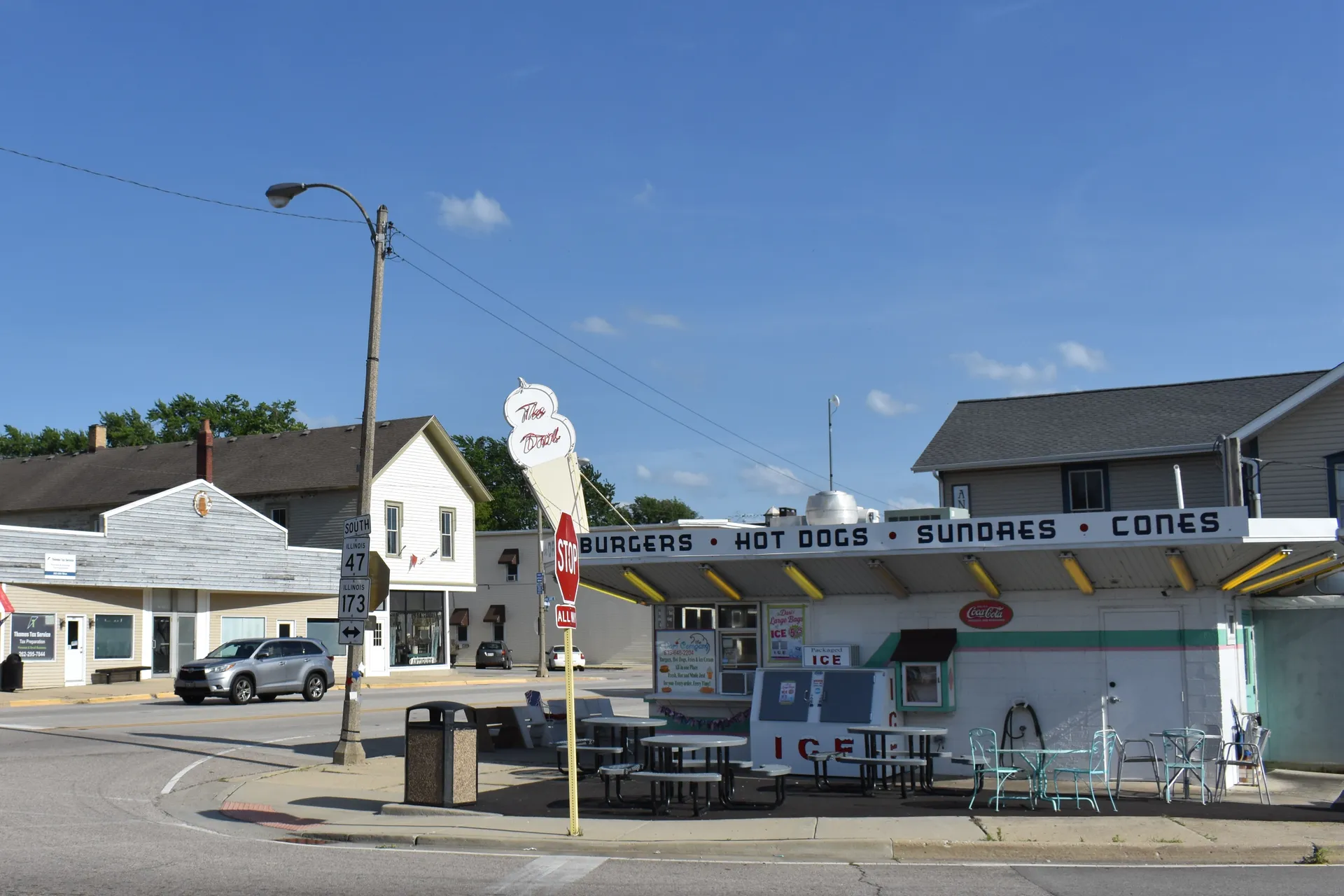 Small-town street with buildings in Hebron, Illinois.