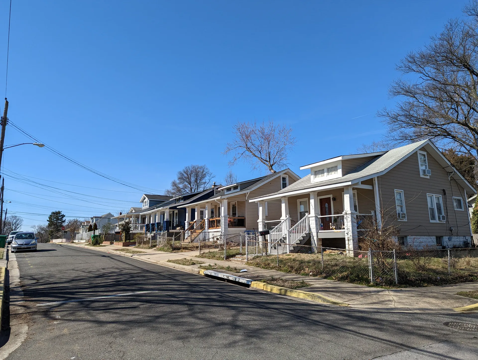 Residential street with homes in Colmar Manor, Maryland.