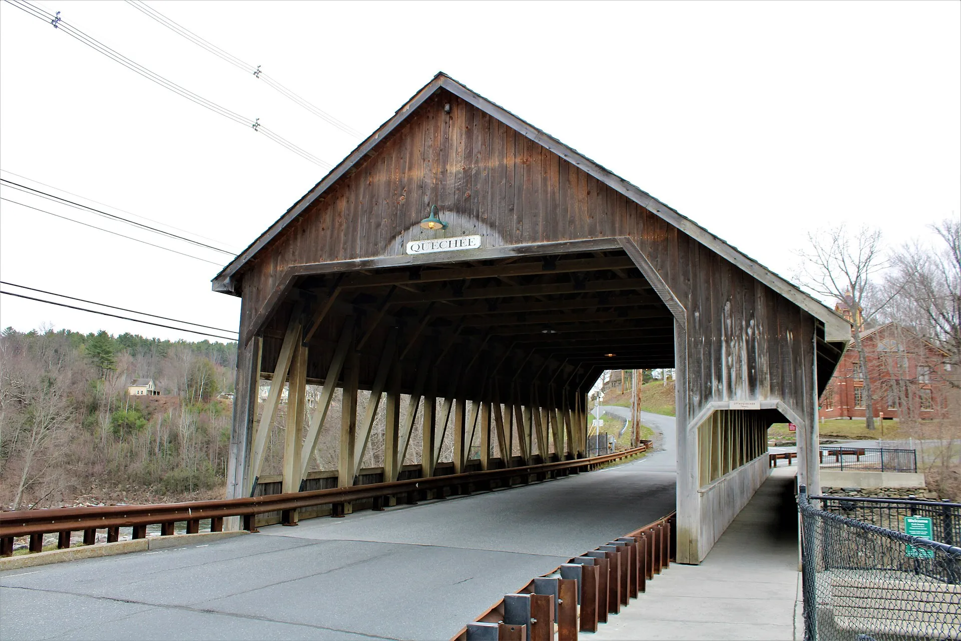 Covered bridge over the river in Quechee, Vermont.