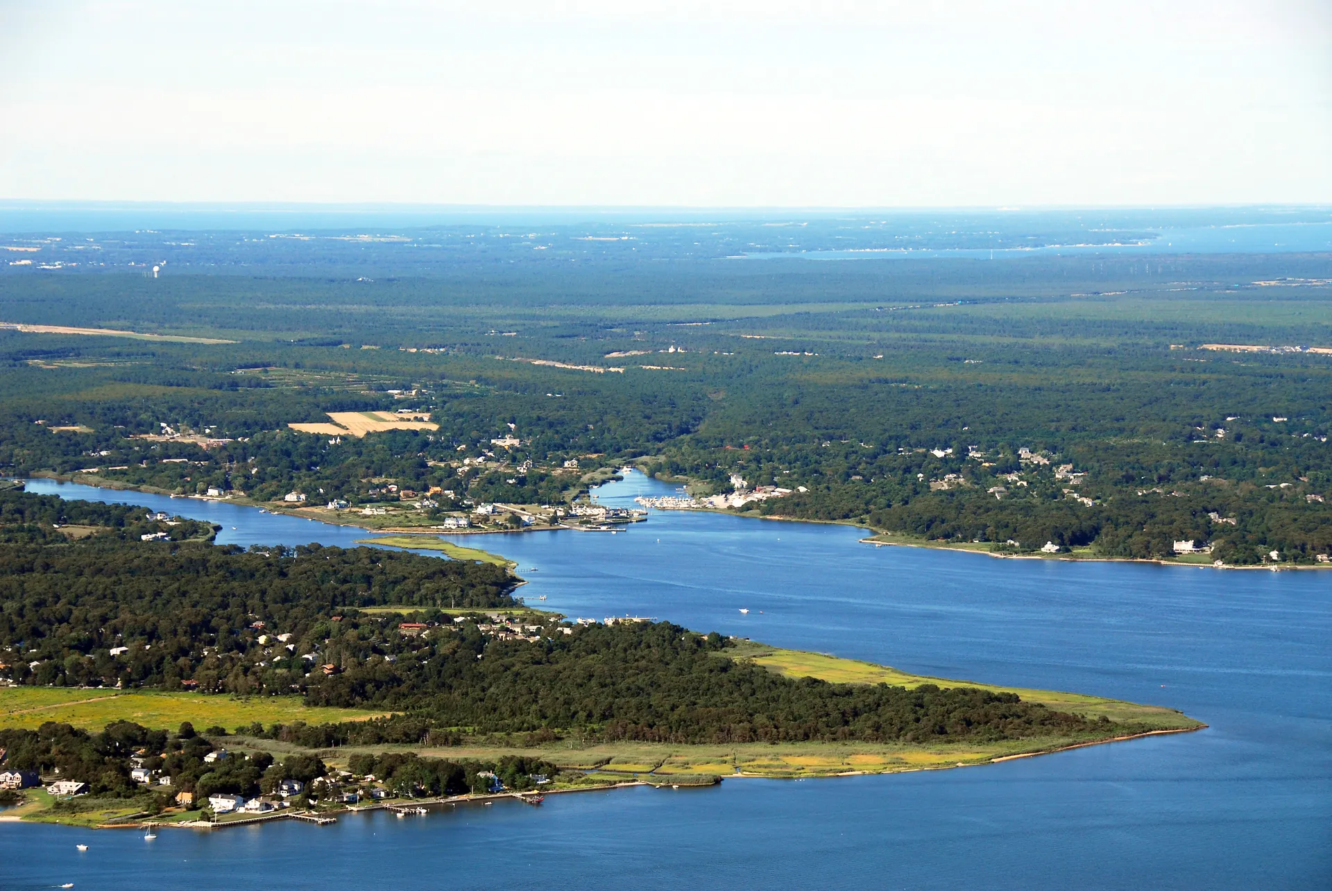 Aerial view over Moriches Inlet and bay shoreline near Moriches, New York.