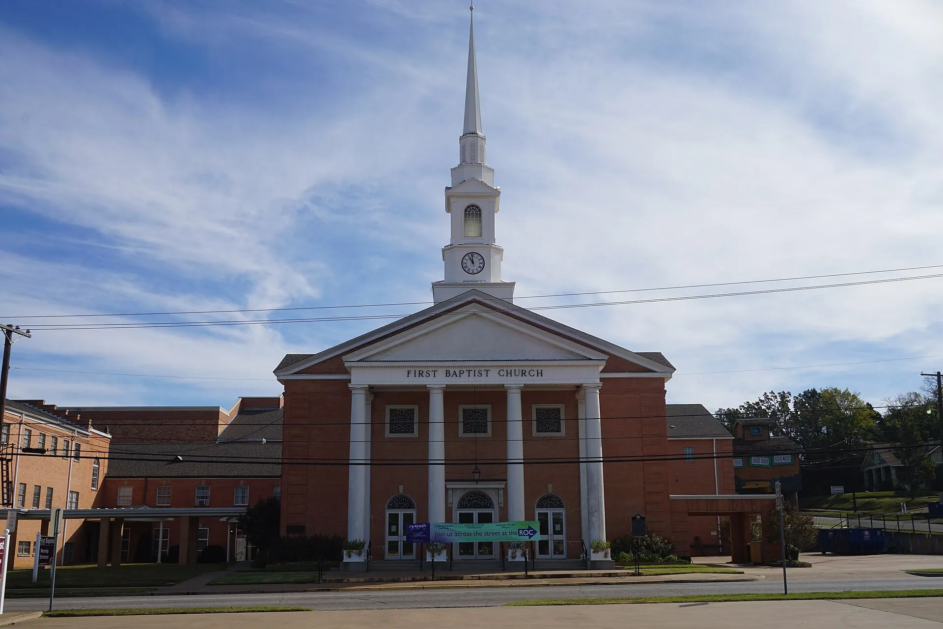 First Baptist Church with a white steeple in Athens, Texas.