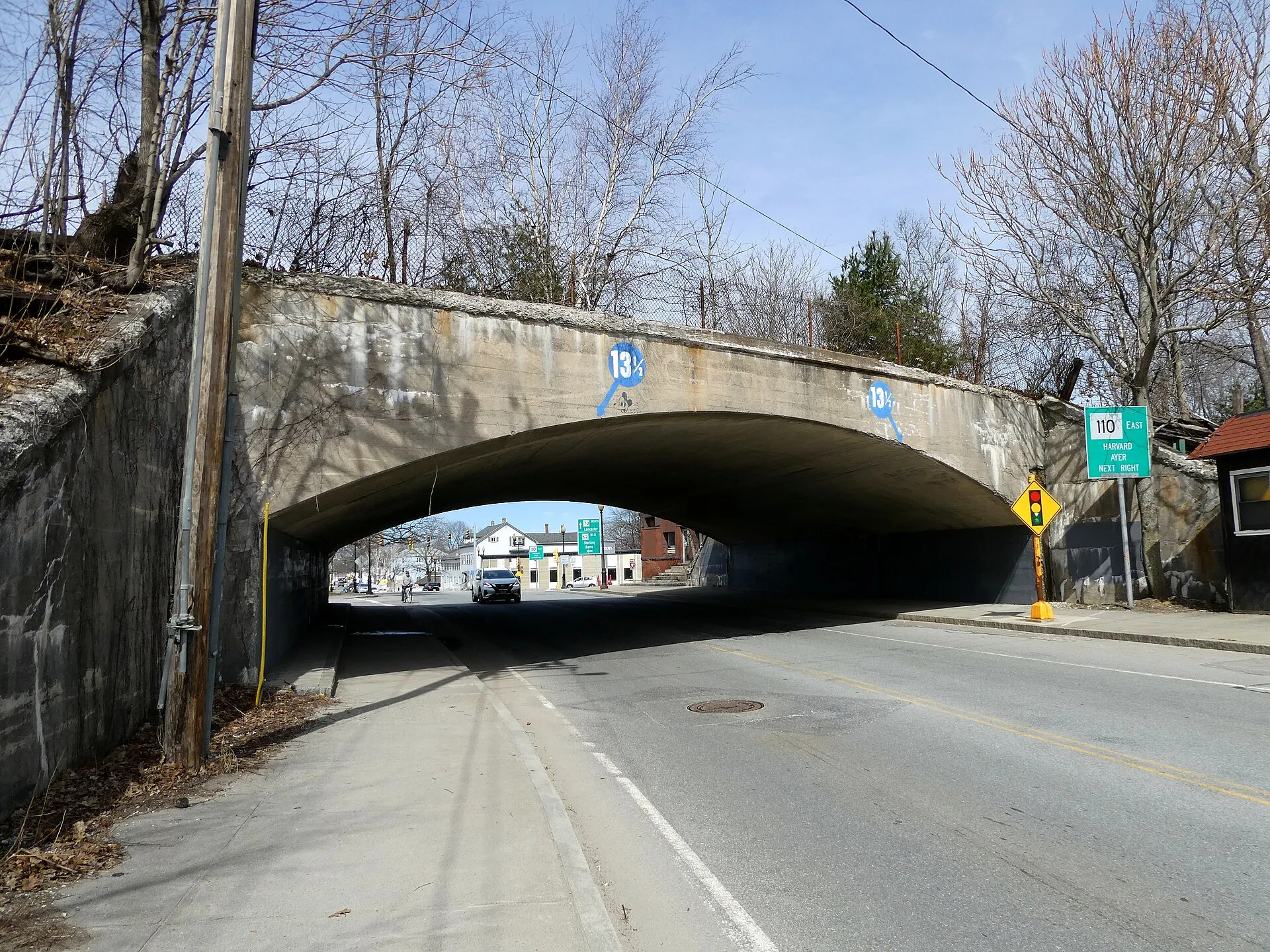 Stone arch bridge spanning Main Street in Clinton, Massachusetts.