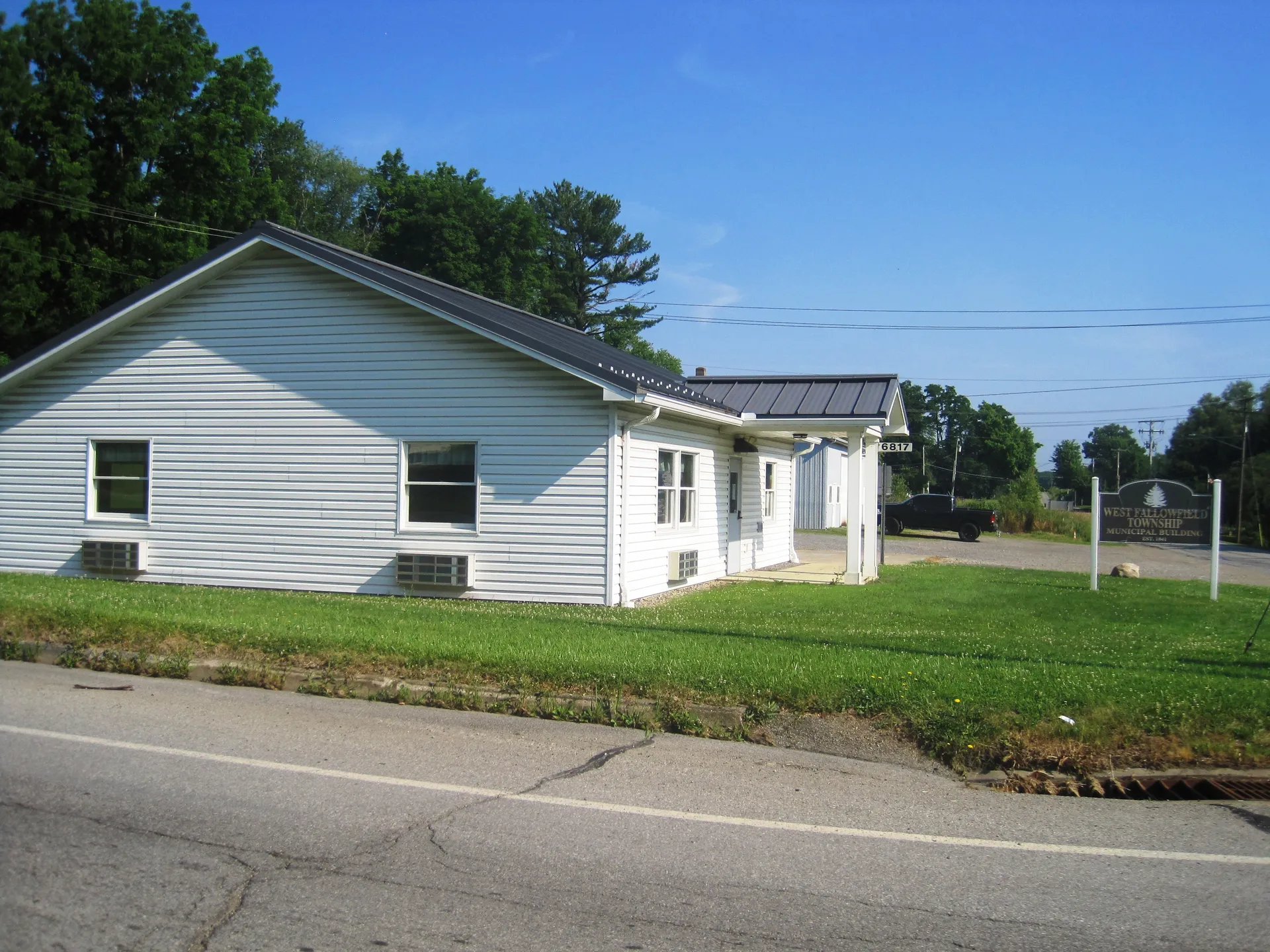 In the village of Hartstown, West Fallowfield Township's municipal office occupies a white single-story building with a neat lawn.