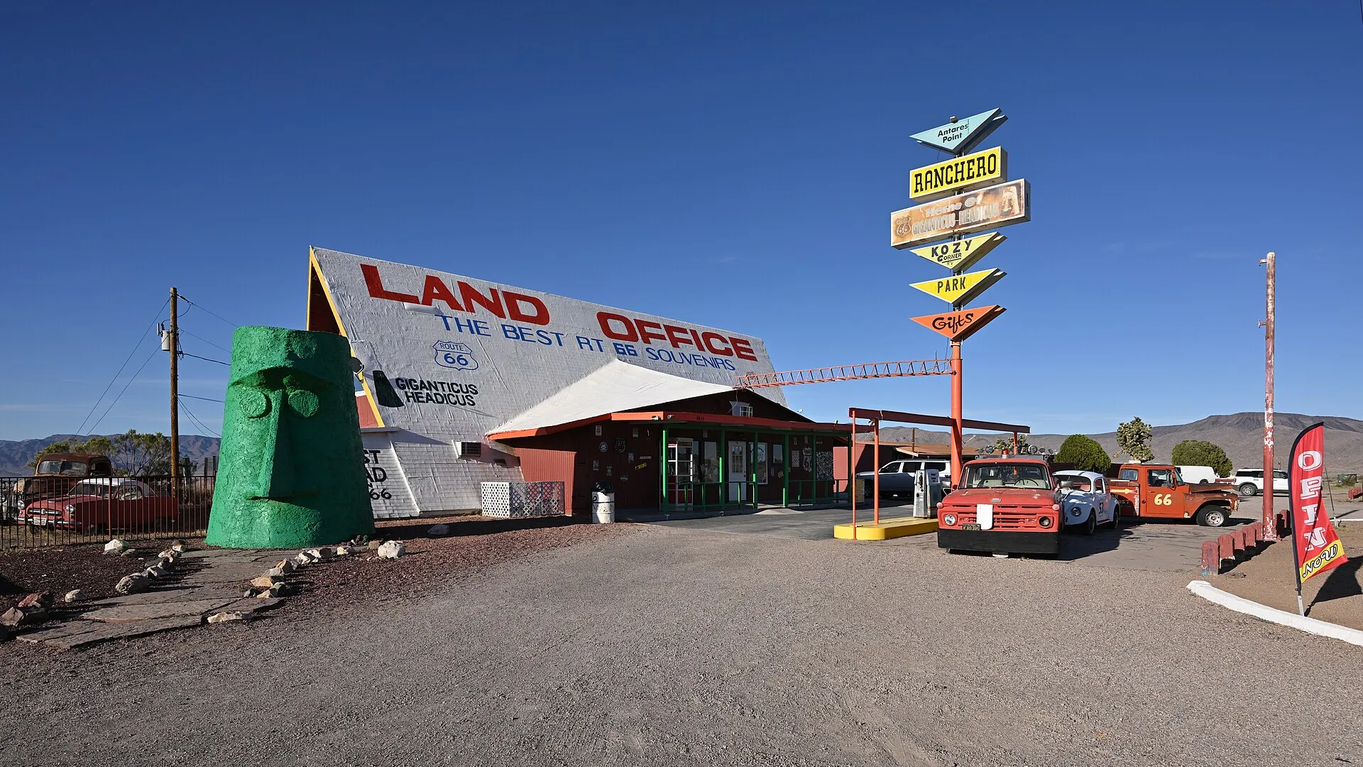 Giganticus Headicus, a giant green tiki head beside a Route 66 souvenir shop in Antares.