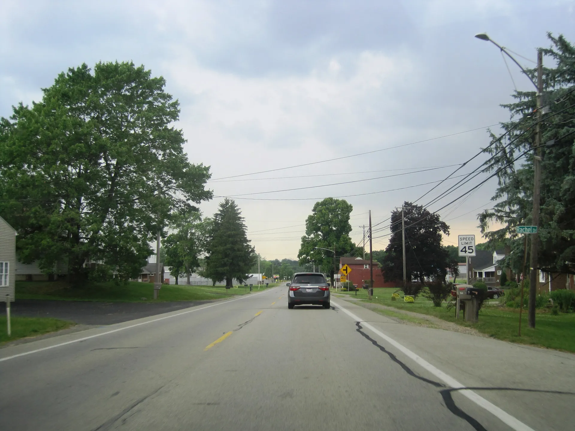 In the Mahoning Township village of Hillsville, West State Street (U.S. 224) carries traffic past lawns and roadside trees.