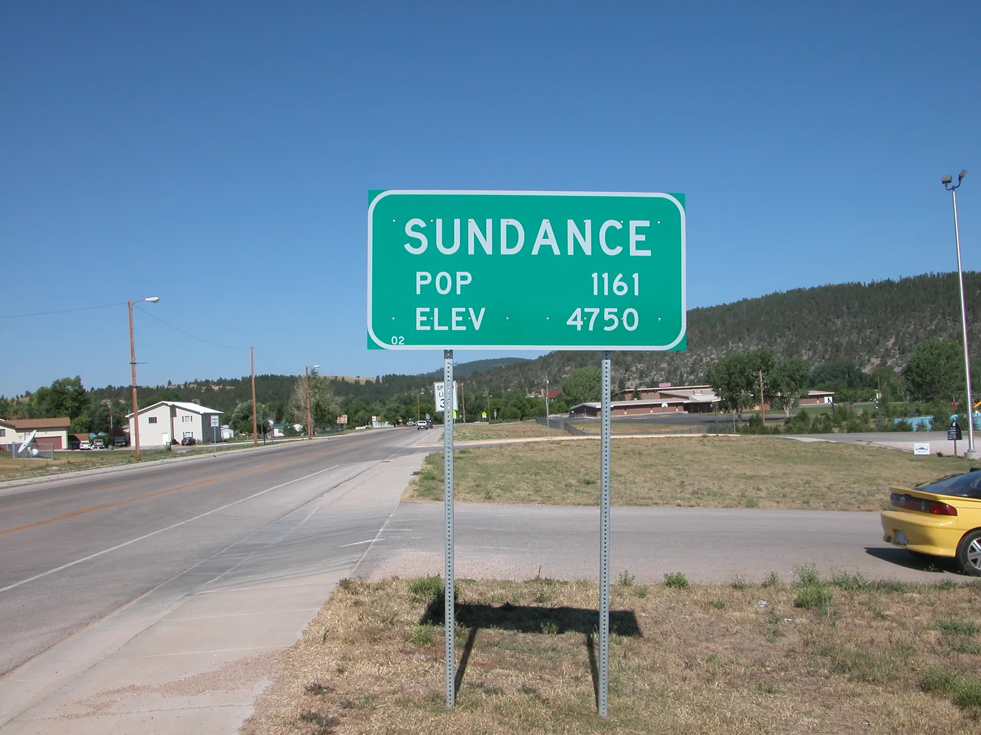 Sundance city limit sign in Sundance, Wyoming.