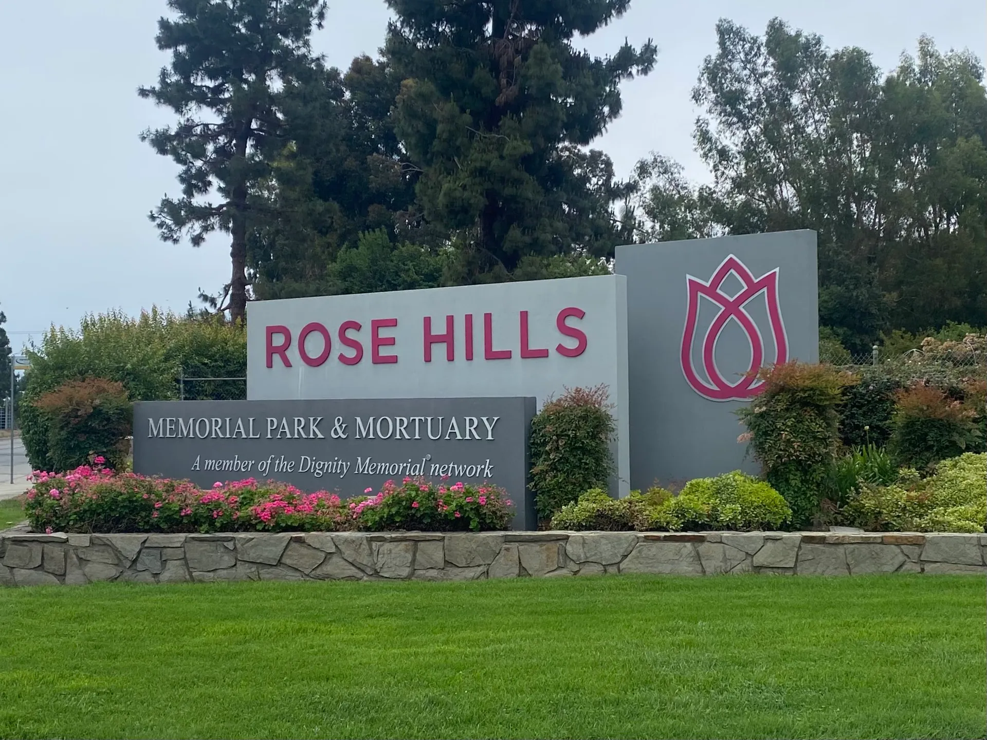 Rose Hills Memorial Park and Mortuary entrance sign in Rose Hills, California.