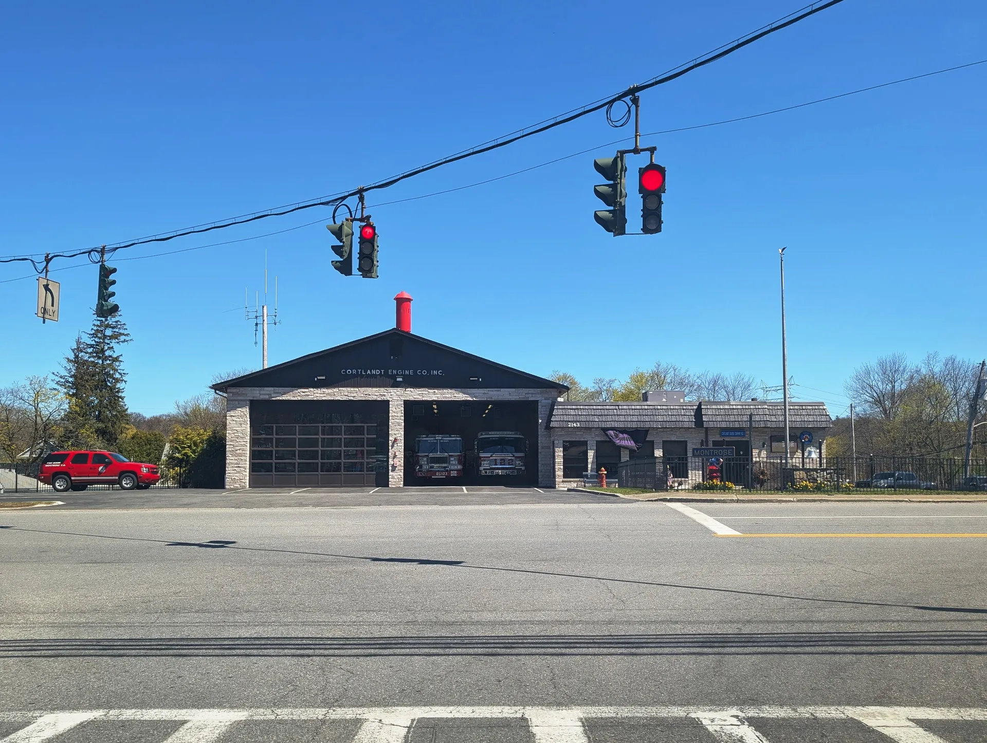 Cortlandt Engine Company firehouse at an intersection in Montrose, New York.
