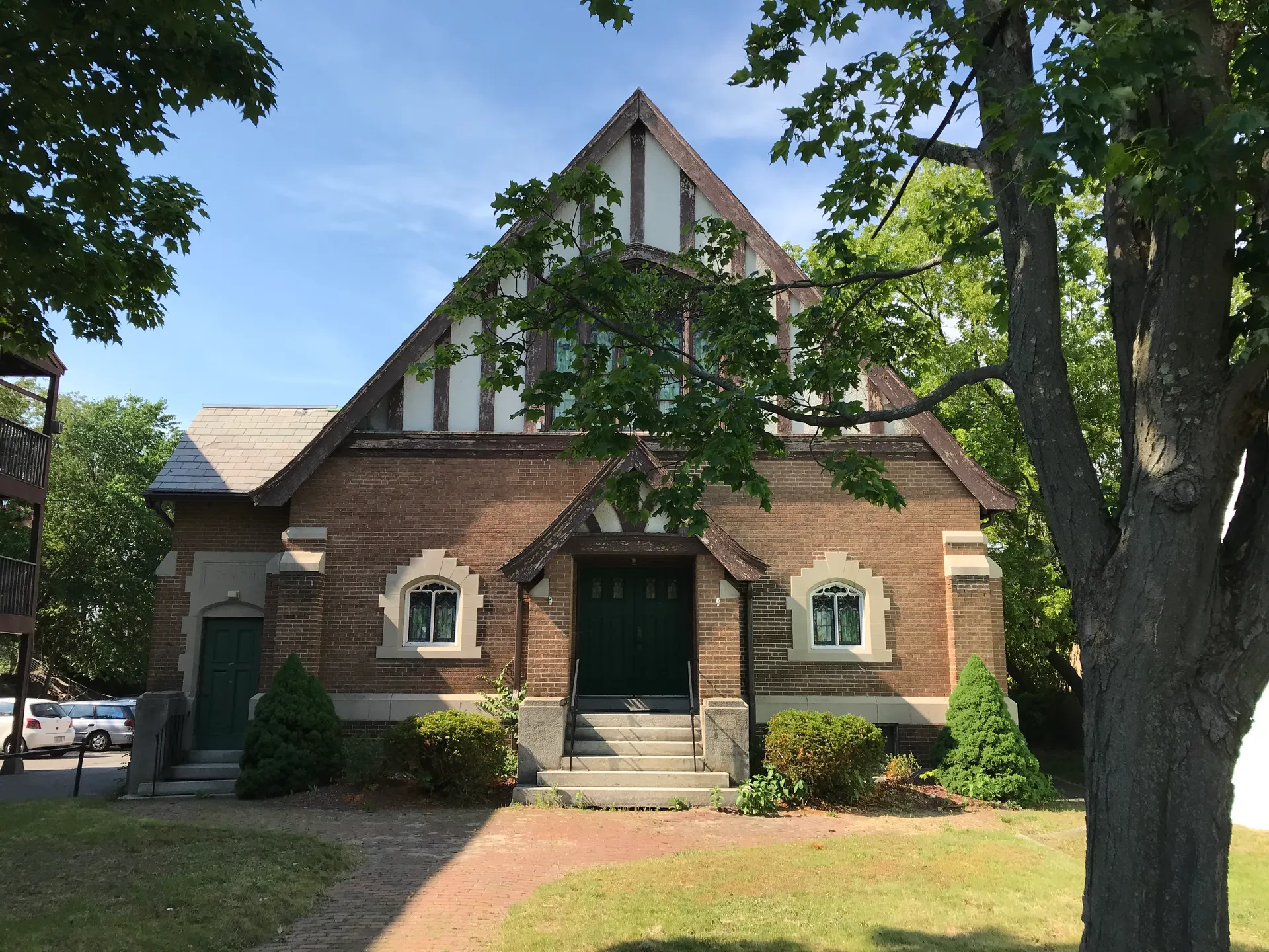 Stone First Church Unitarian with Gothic details in Athol, Massachusetts.