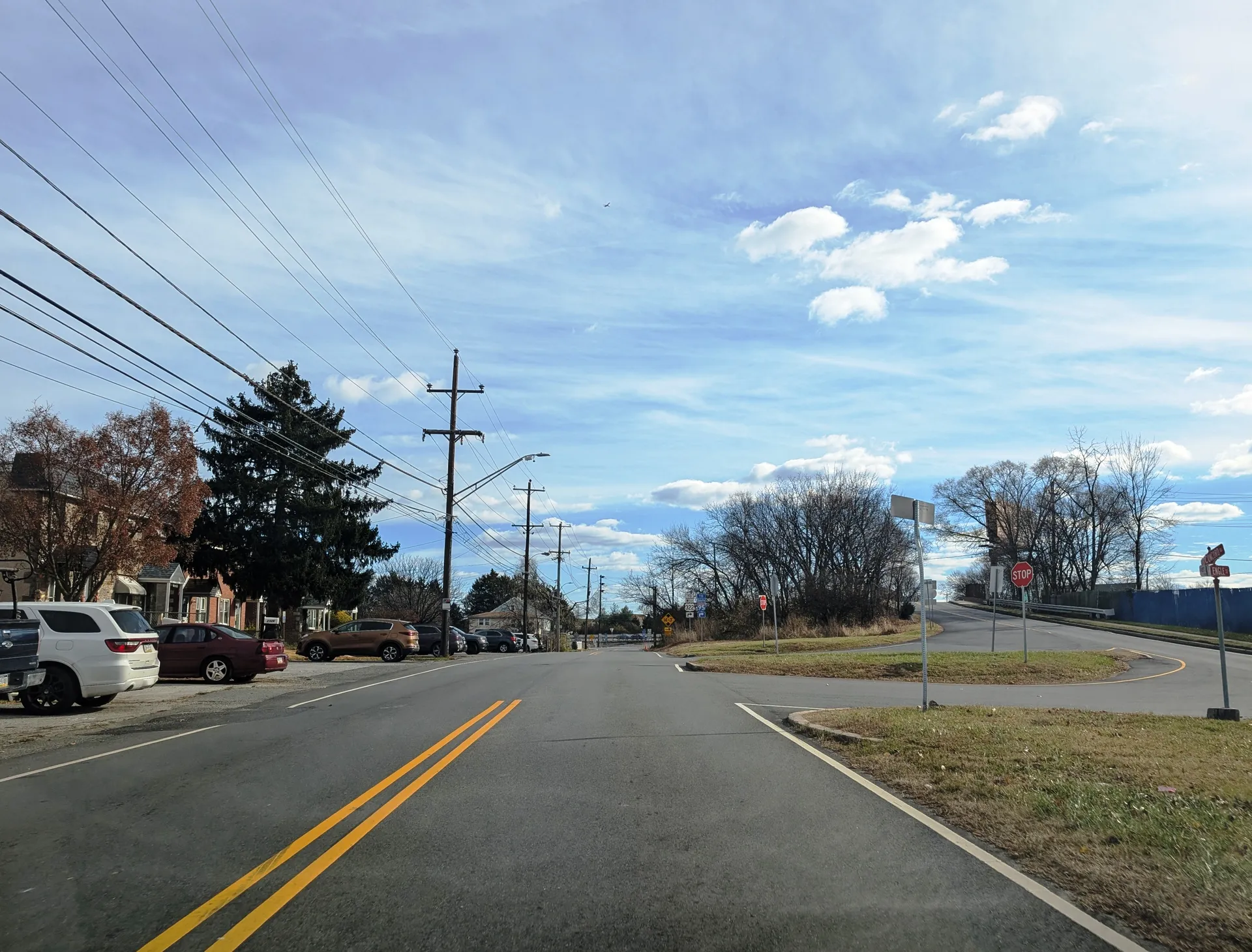 Concord Road passes through the village of Feltonville in Chester Township at Engle Street, with homes and a gas station nearby.