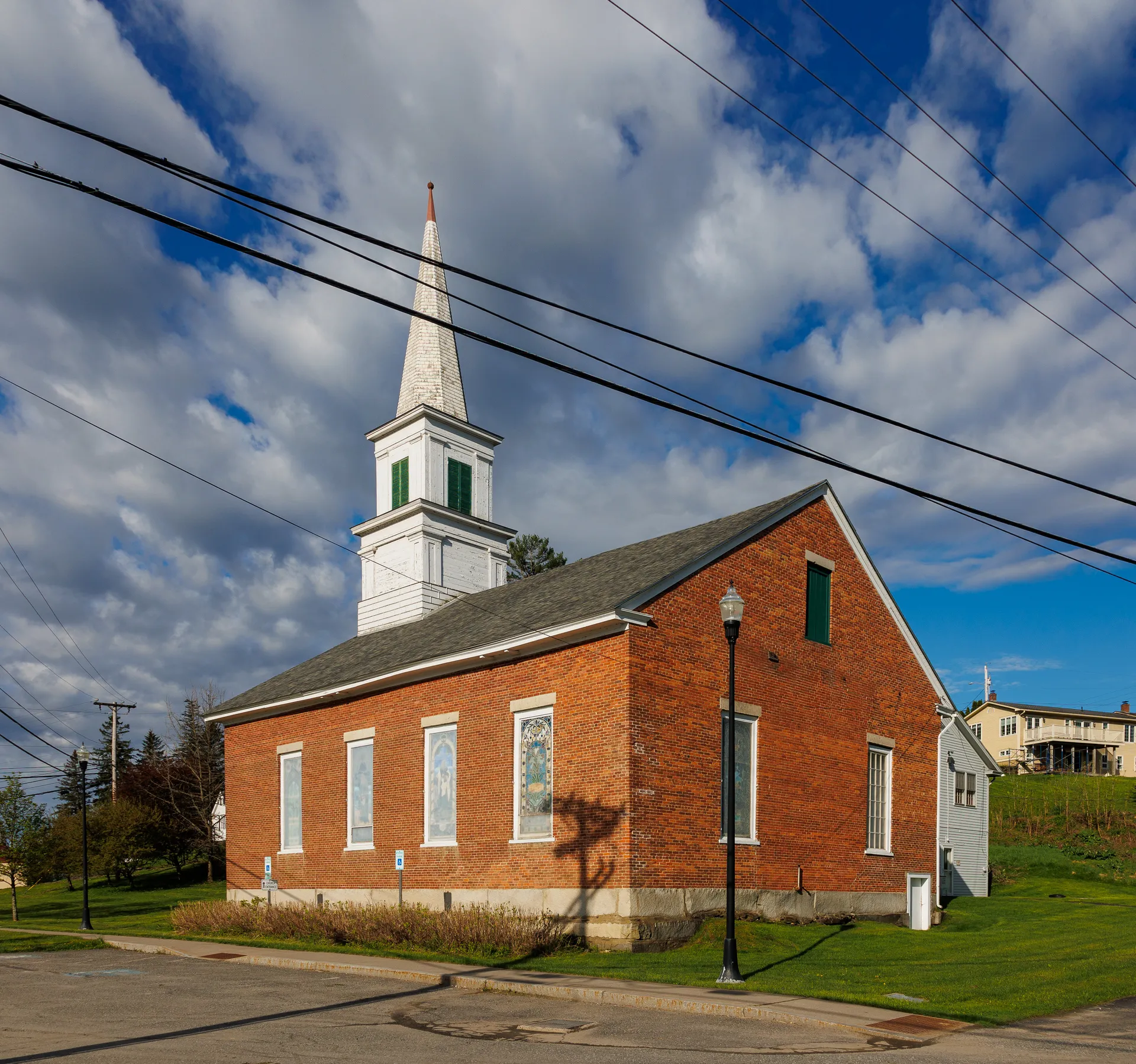 Old Brick Church with white steeple in East Montpelier, Vermont.