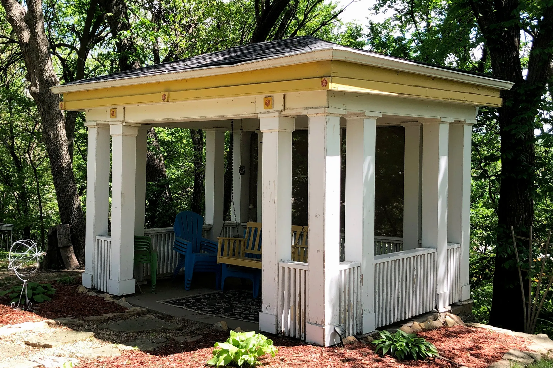 White garden gazebo at the George A. Marshall House in Arlington, Nebraska.