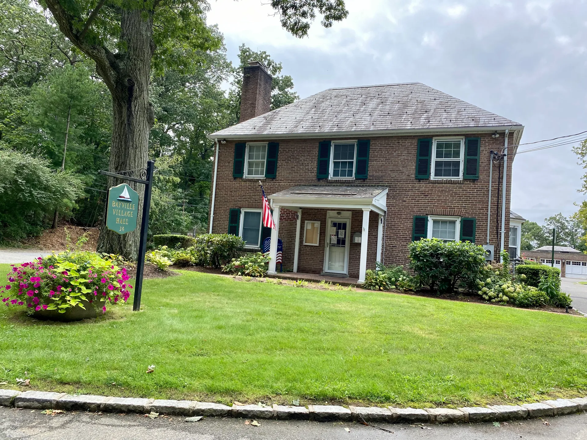 Brick colonial Bayville Village Hall, Library, and Museum in Bayville, New York.
