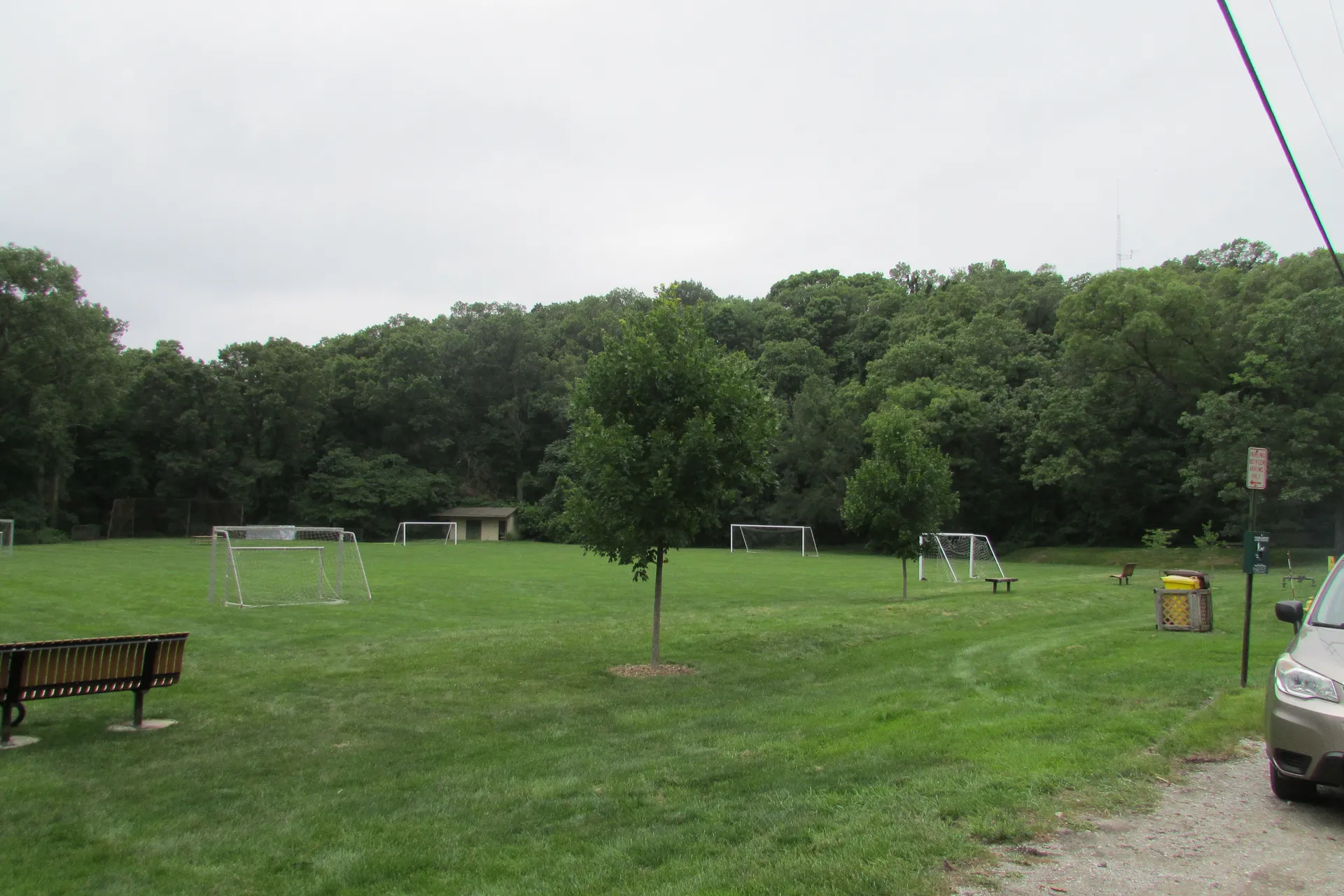 Green park lawn and trees in Ogden Dunes, Indiana.