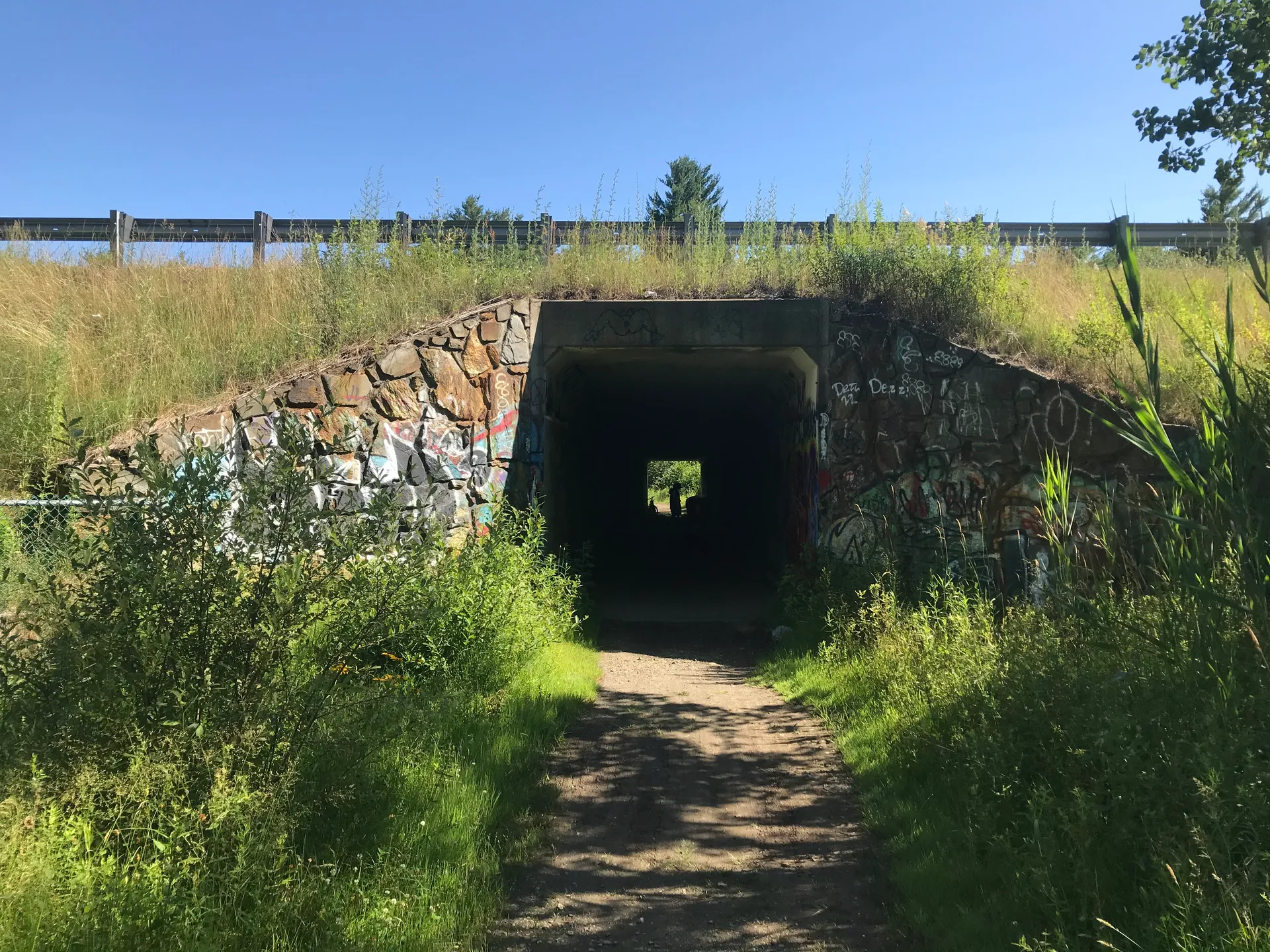 Stone tunnel on the Rockingham Recreational Rail Trail in Epping, New Hampshire.