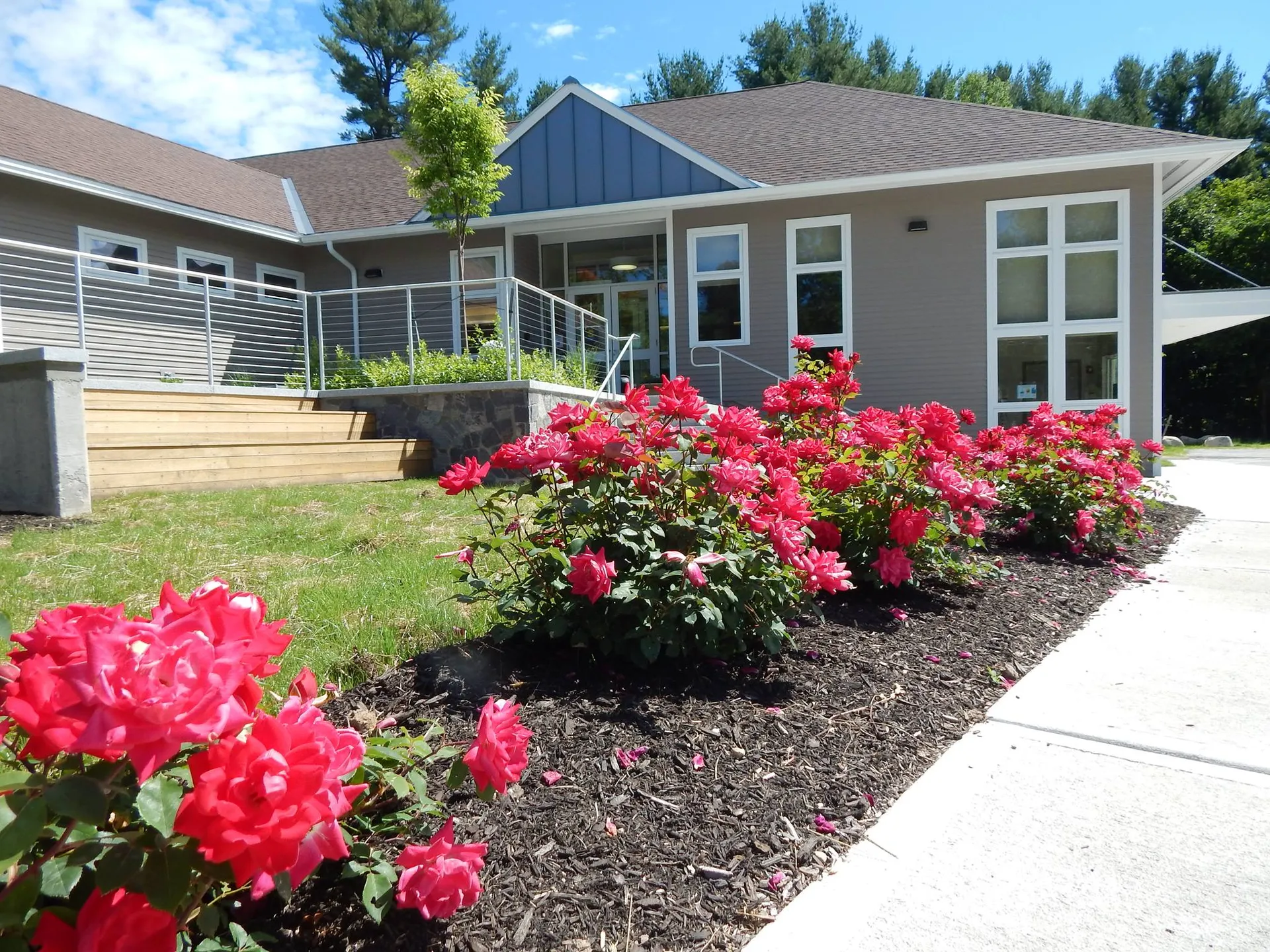Gray Public Library with flower gardens in Gray, Maine.