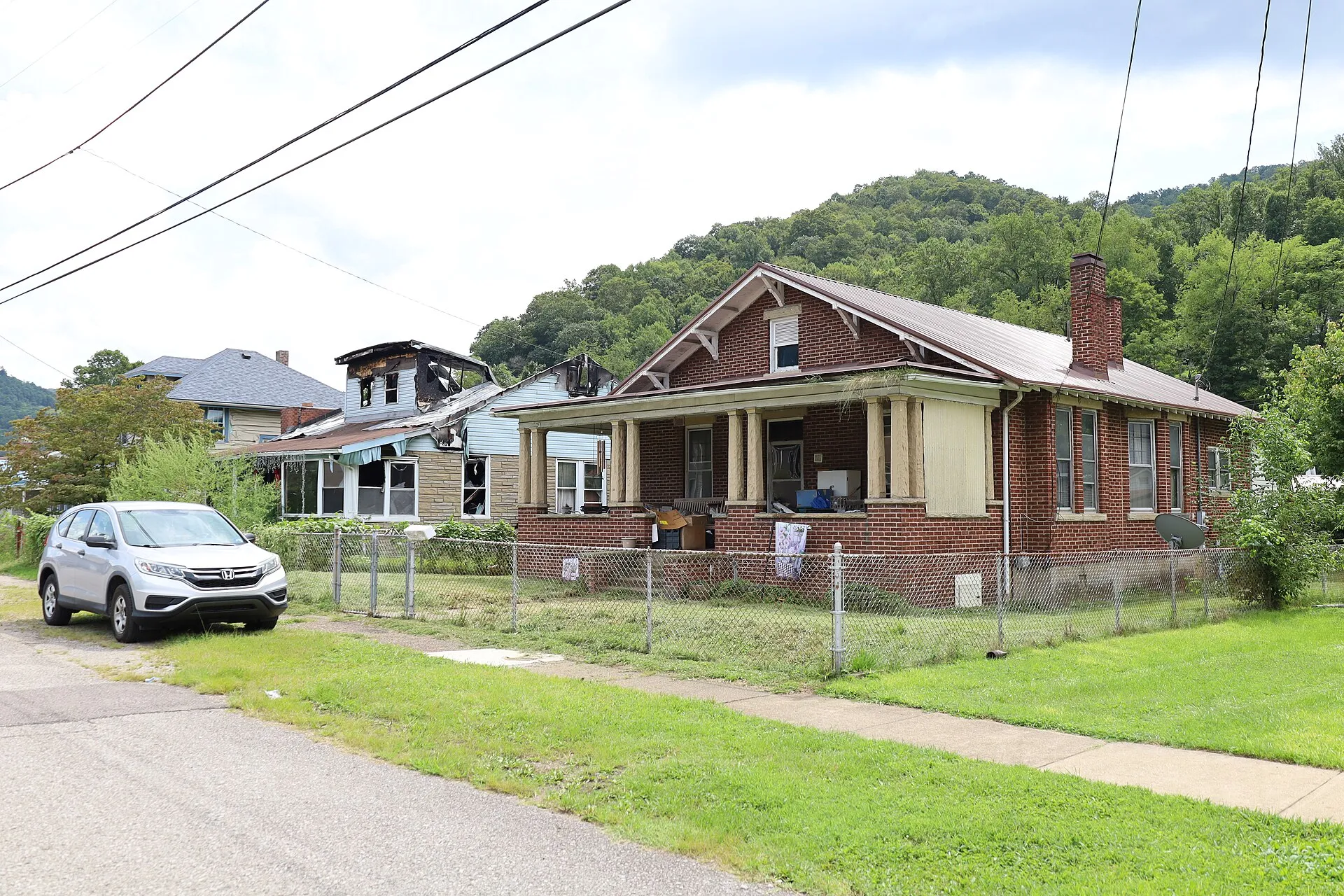 Homes on a hillside street in the Pratt Historic District, West Virginia.