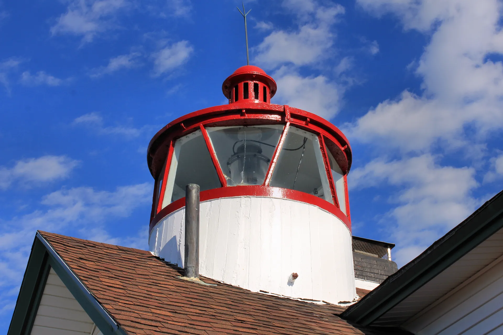 West Dennis Light, a red-and-white lighthouse on Cape Cod in West Dennis, Massachusetts.