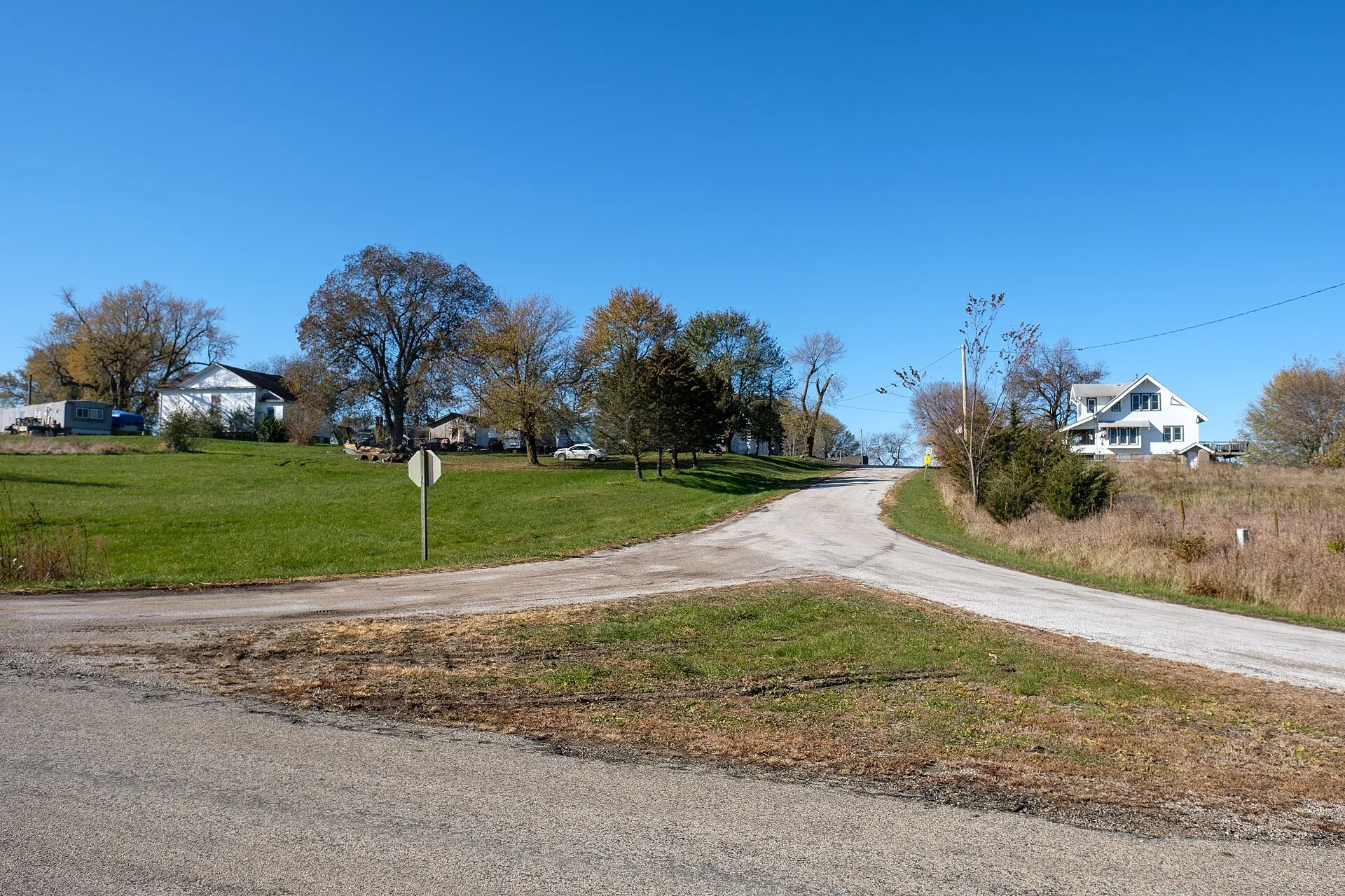 Open park land and trees in Delphos, Iowa.