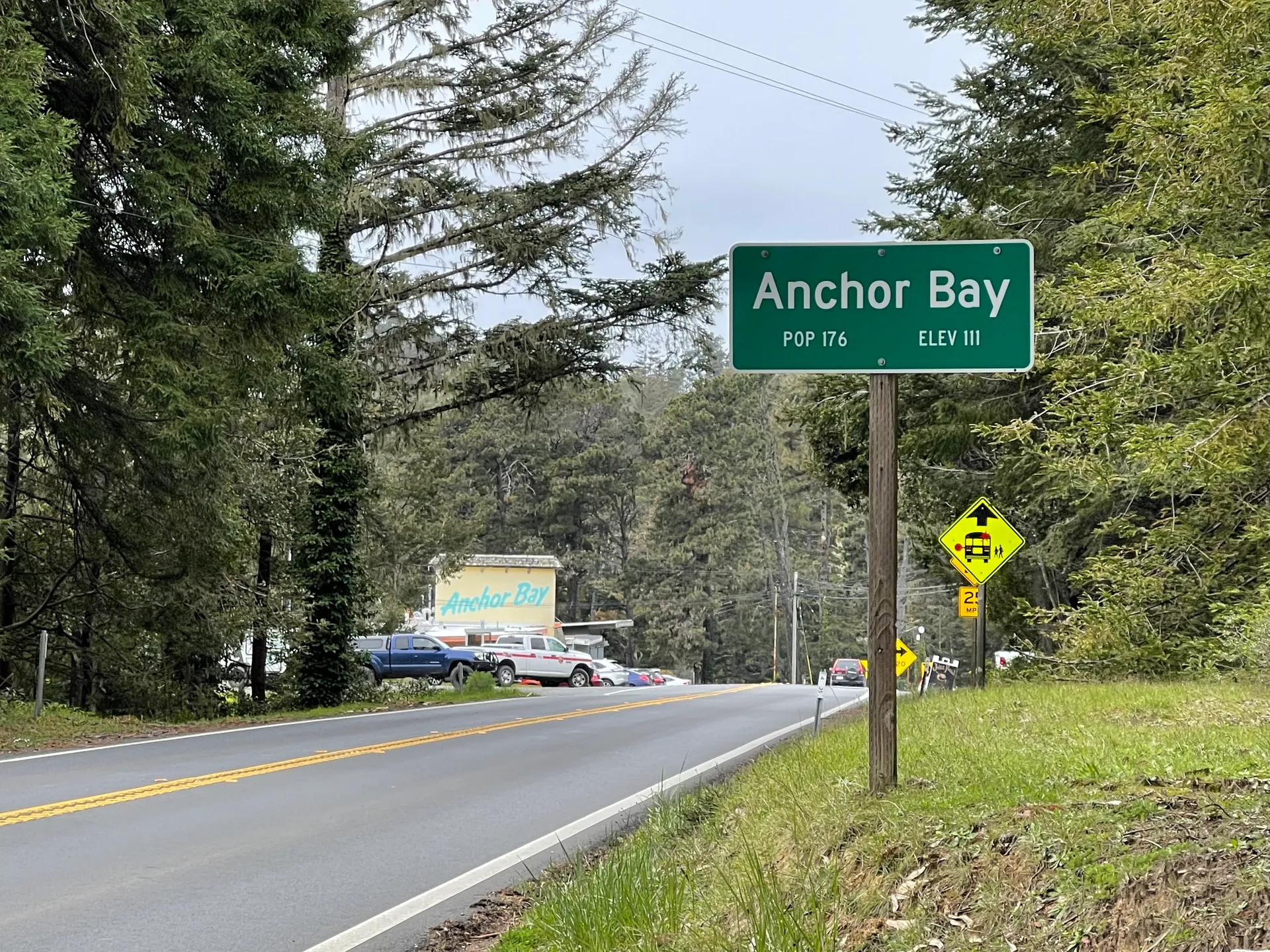 Roadside welcome sign in Anchor Bay, California.