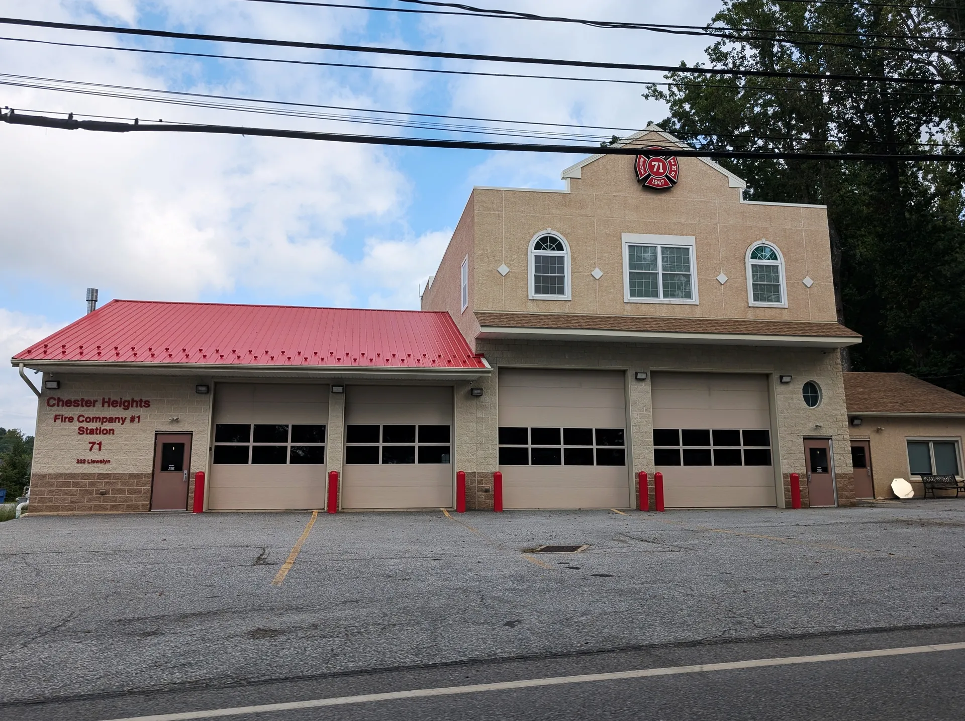 Chester Heights Fire Company No. 1, Station 71, features a stucco front with a red roof and several garage bays on Llewelyn Road.