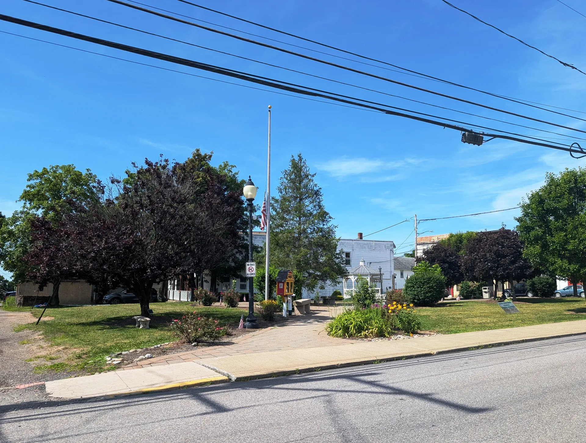 Martin Square, a small landscaped park in Freeland, features shade trees and flower beds along South Street.