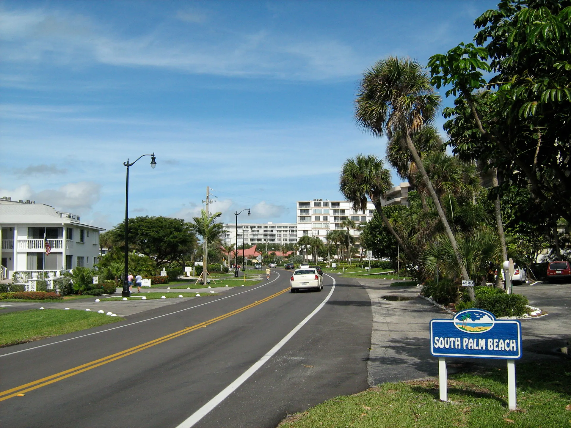 A South Palm Beach town sign beside State Road A1A in South Palm Beach, Florida.