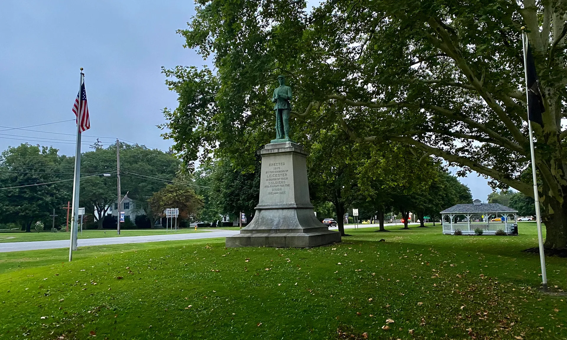 Soldiers' Monument on a green lawn in Leicester, New York.