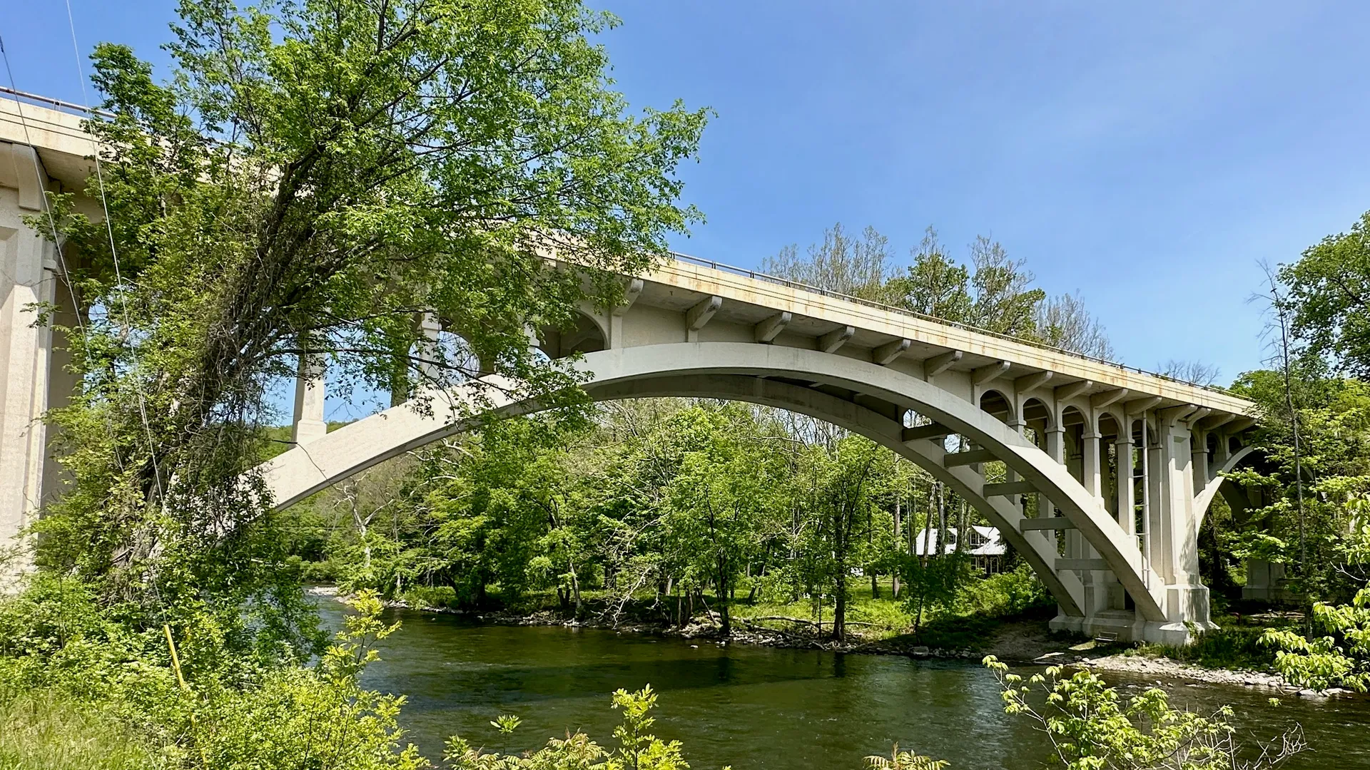 Cornwall Bridge arching over the Housatonic River in Cornwall Bridge, Connecticut.