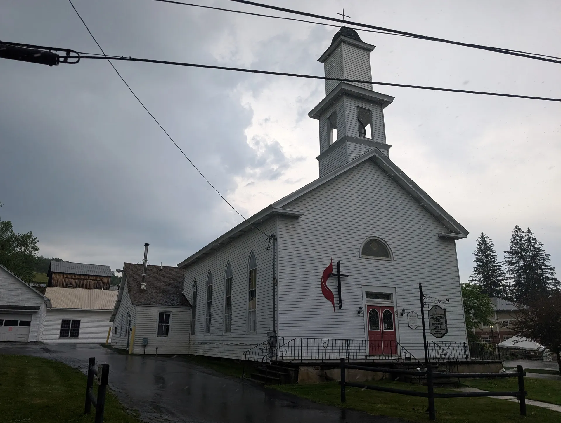 White United Methodist Church with a steeple in Grahamsville, New York.