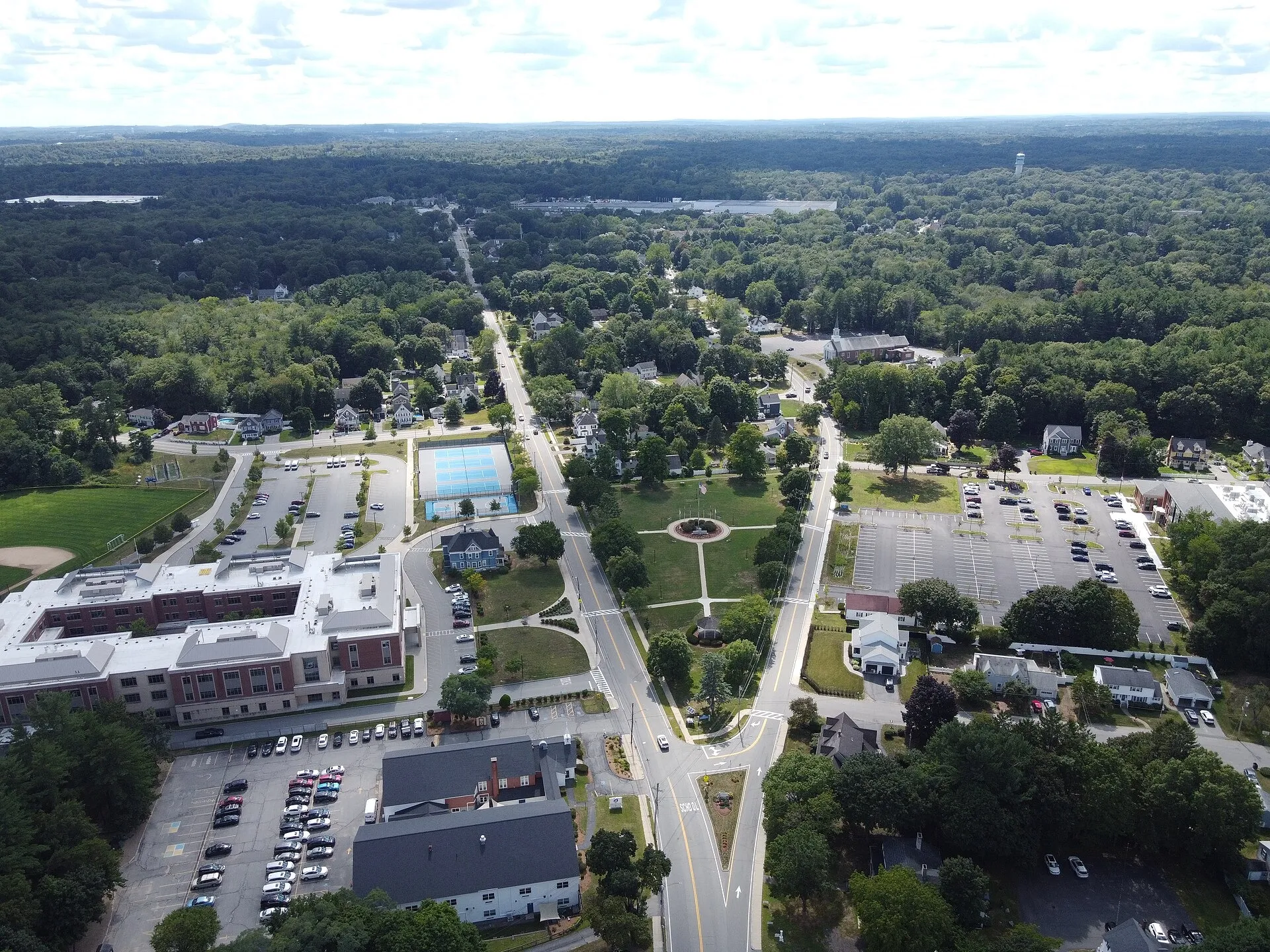 WilmingtonTownCenterDroneShotFacingSW-Aug26-2026. Wilmington Town, MA.