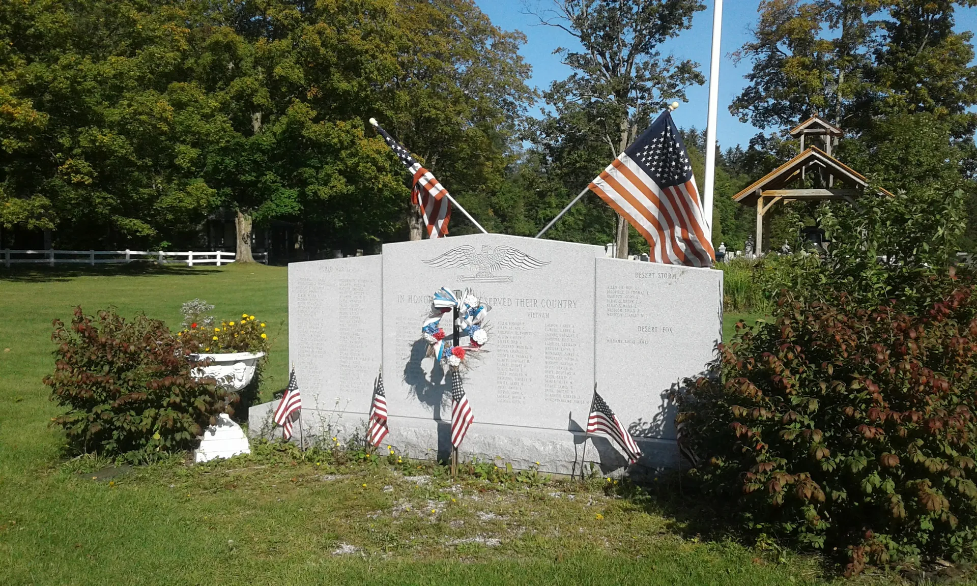 Veterans memorial with flags in Bakersfield, Vermont.