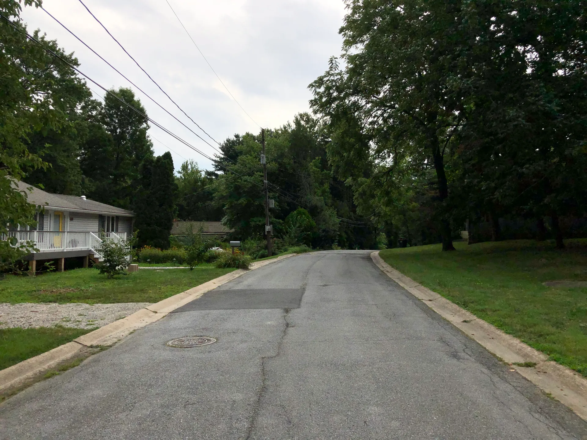 Shaded Sunset Lane in the village of Ardencroft, Delaware.